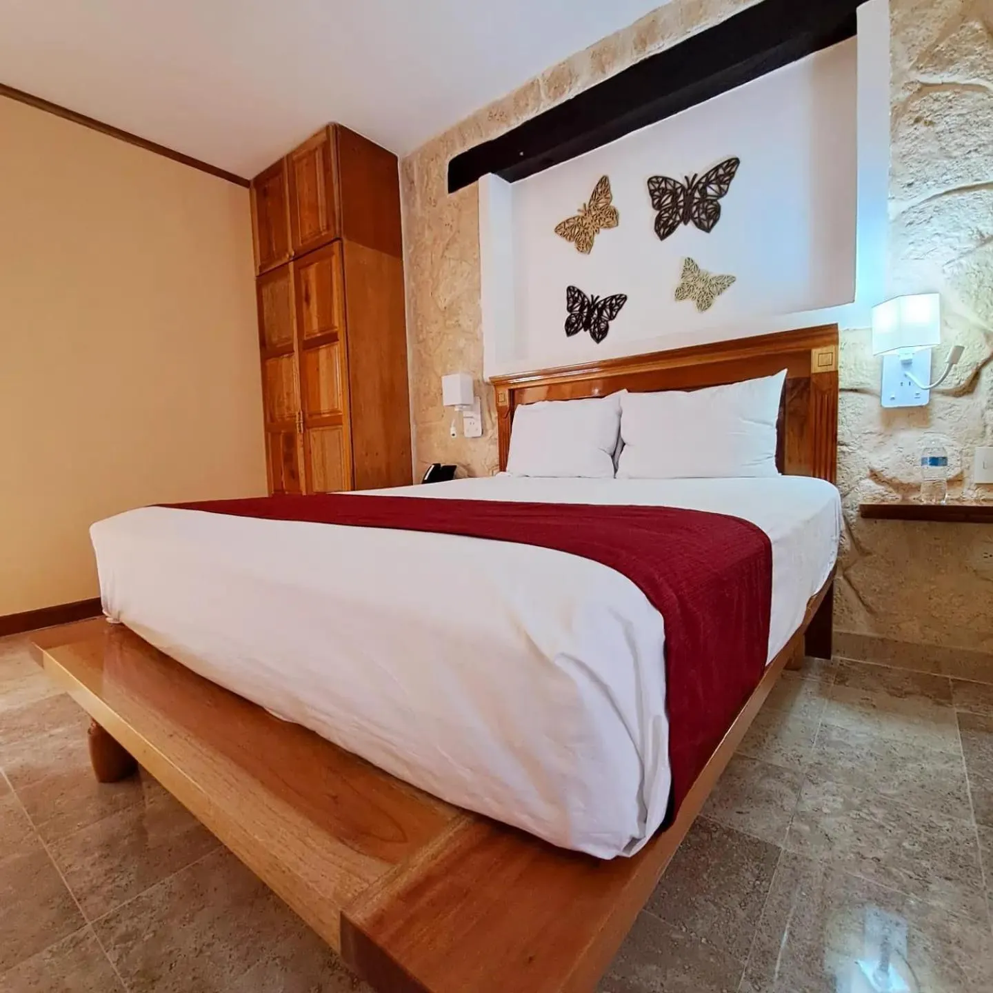 Bed in Cancun International Suites