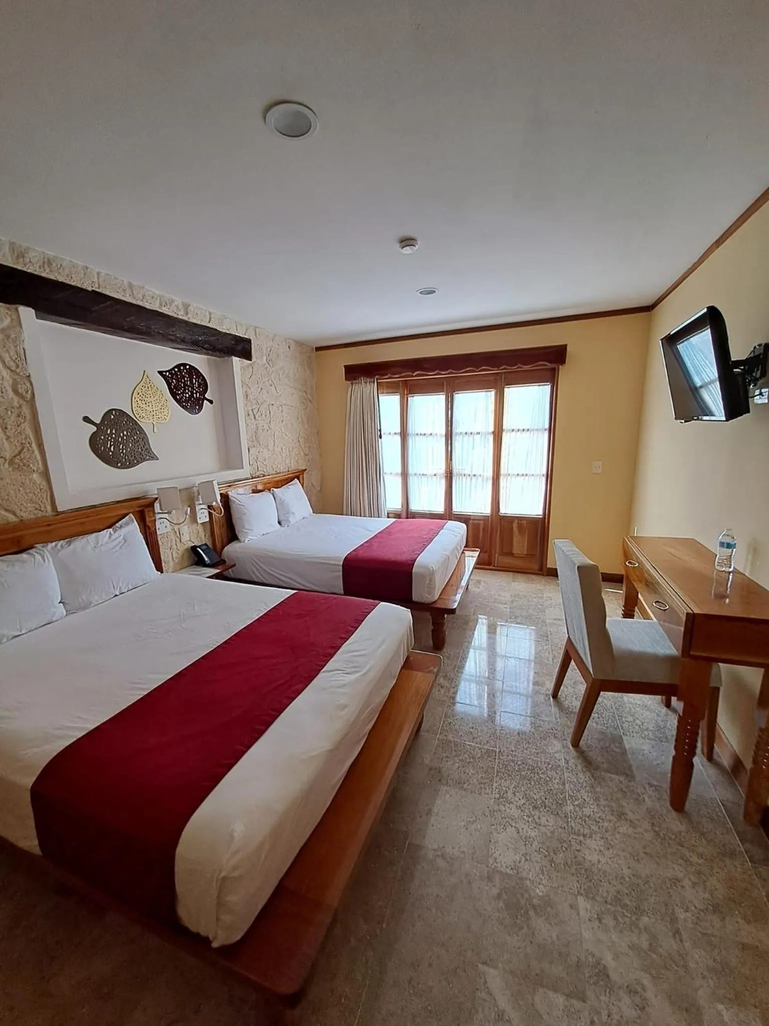 Bed in Cancun International Suites