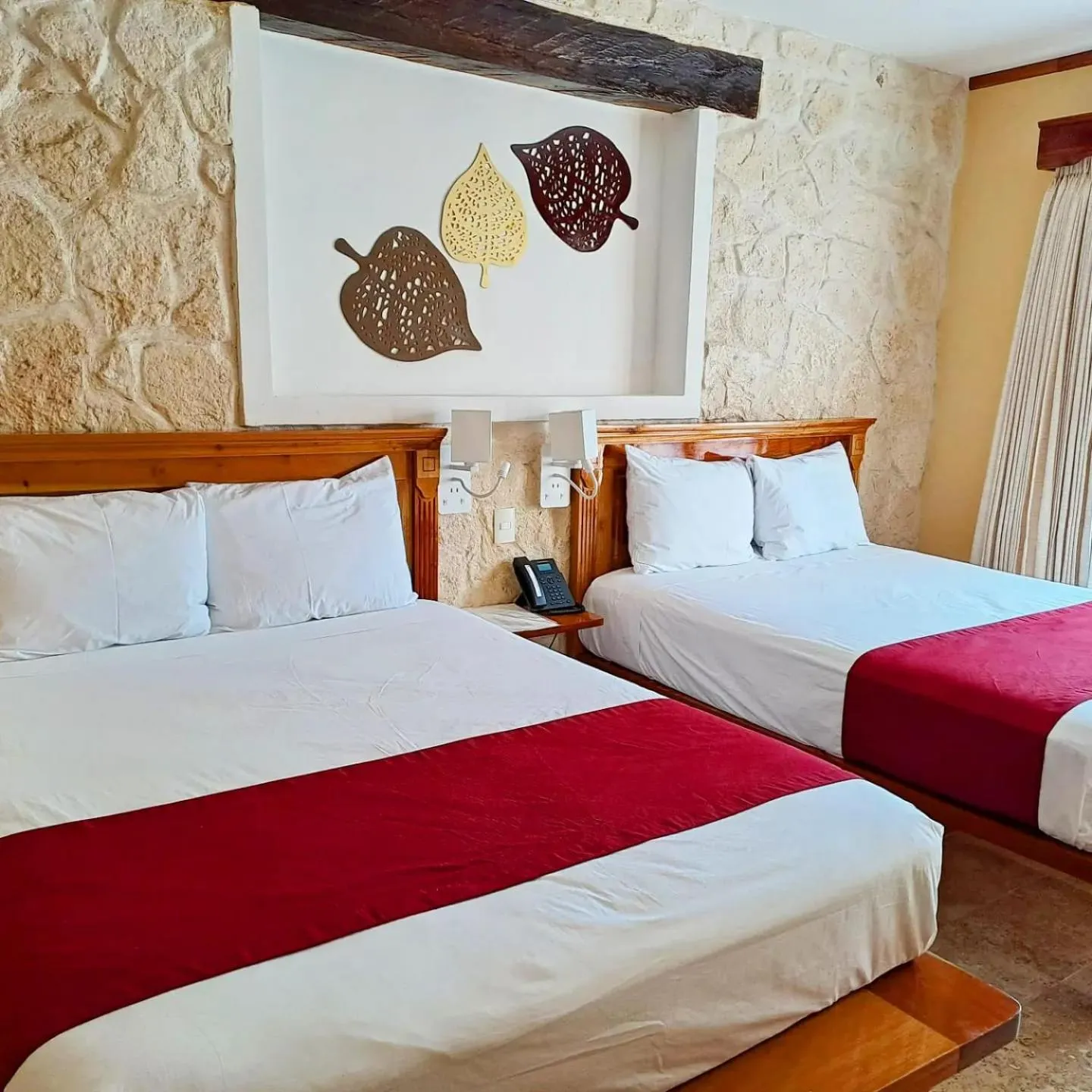 Bed in Cancun International Suites