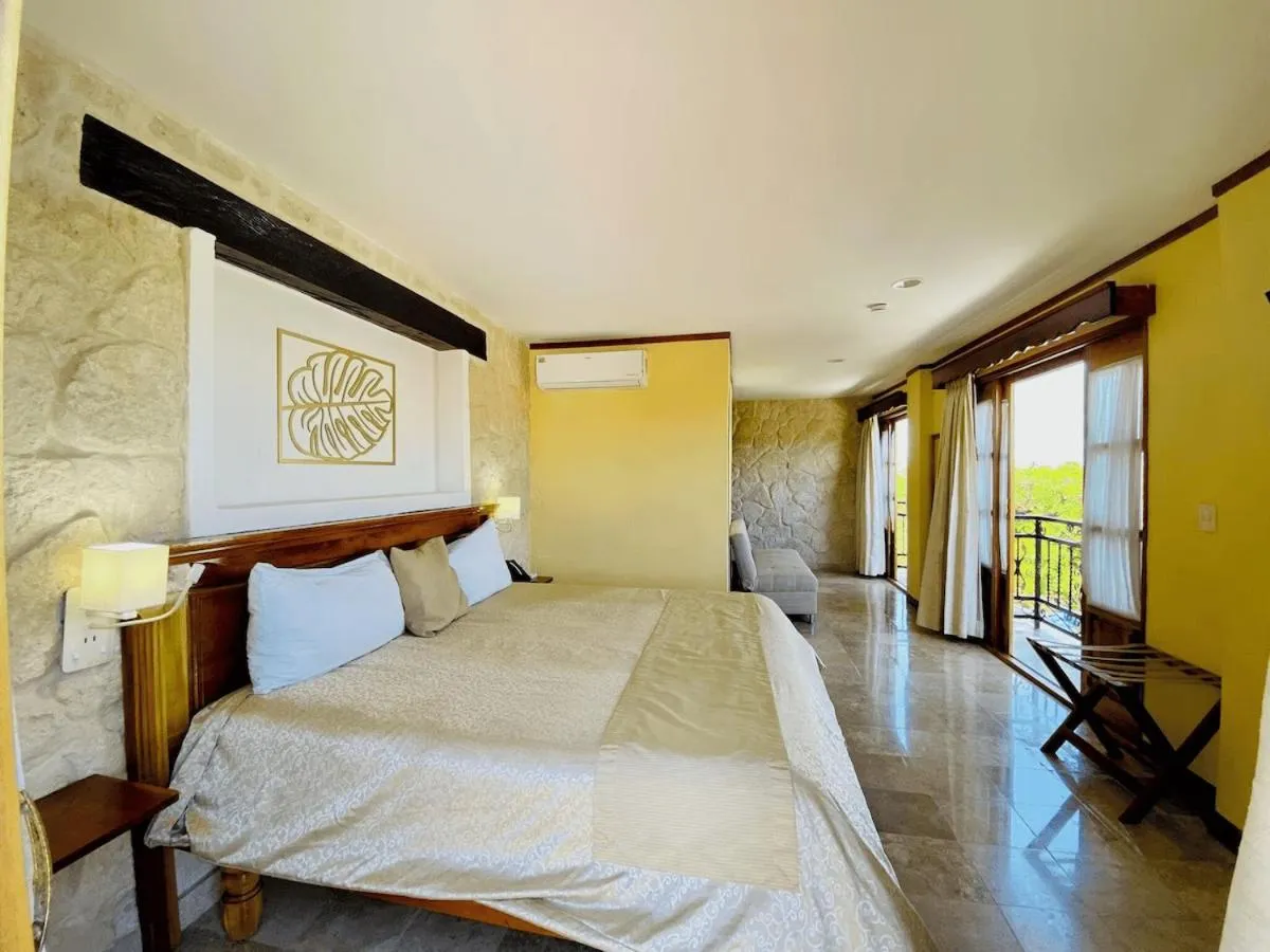 Bed in Cancun International Suites