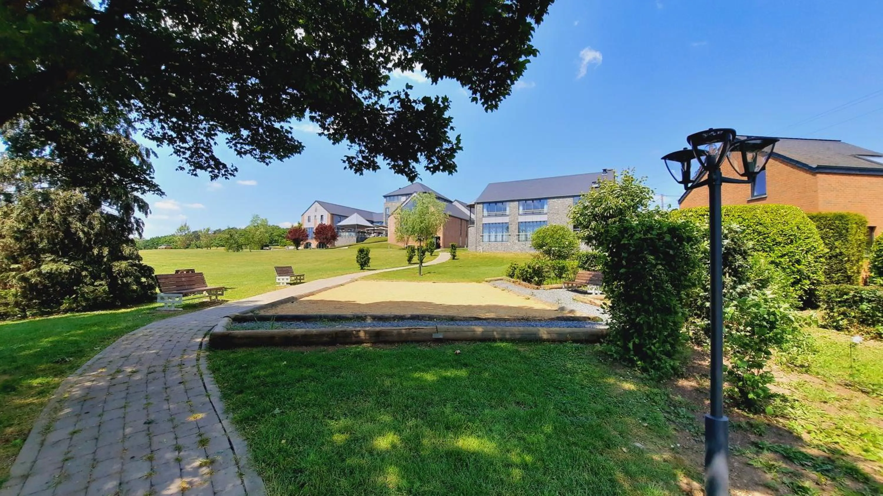 Garden view in Maisons de Vacances Azur en Ardenne