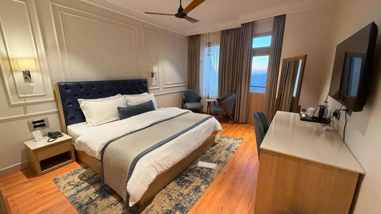 Bed in Hotel M AND RESORT