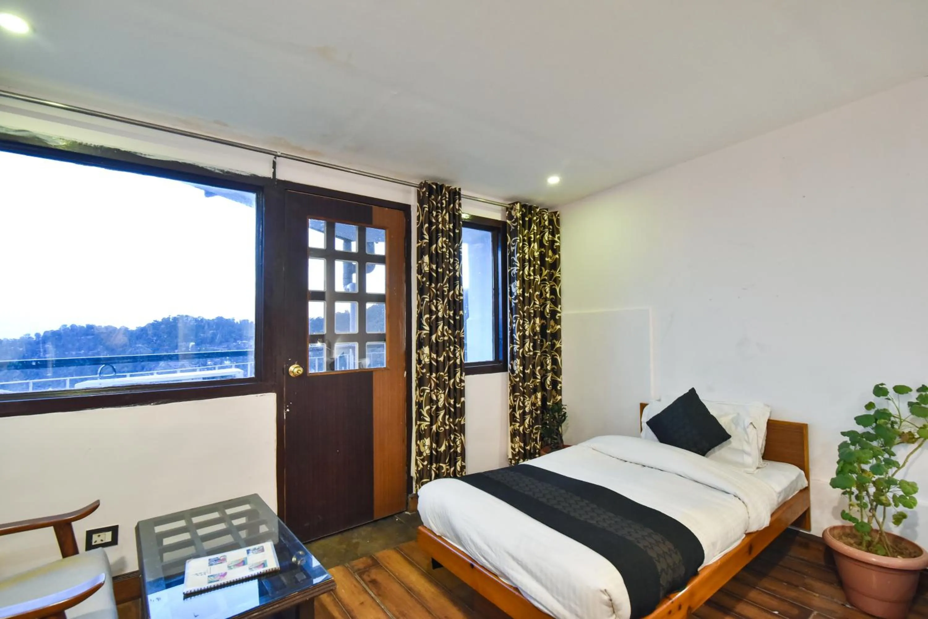 Bed in Hotel M AND RESORT