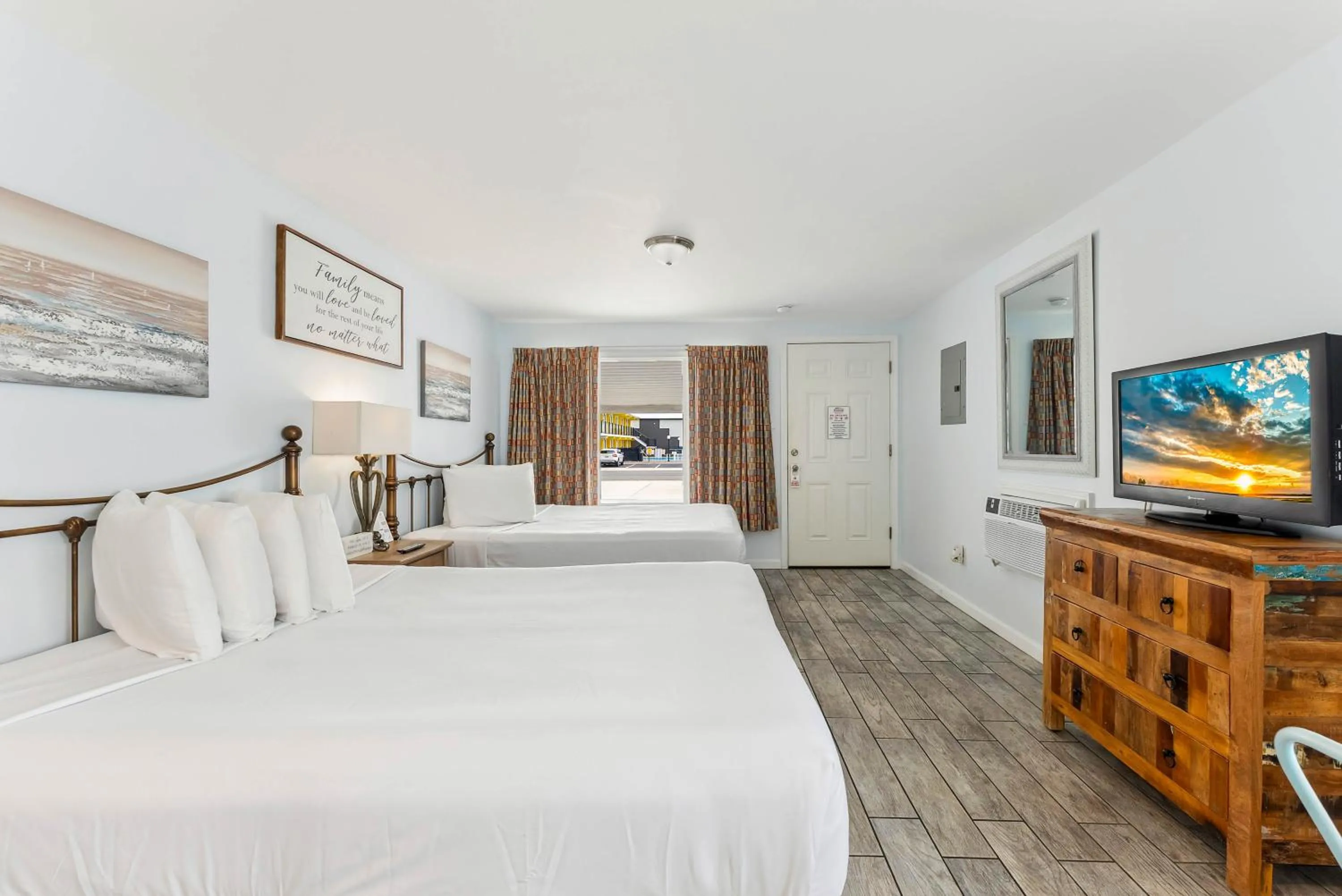 Bed in Daytona Inn and Suites