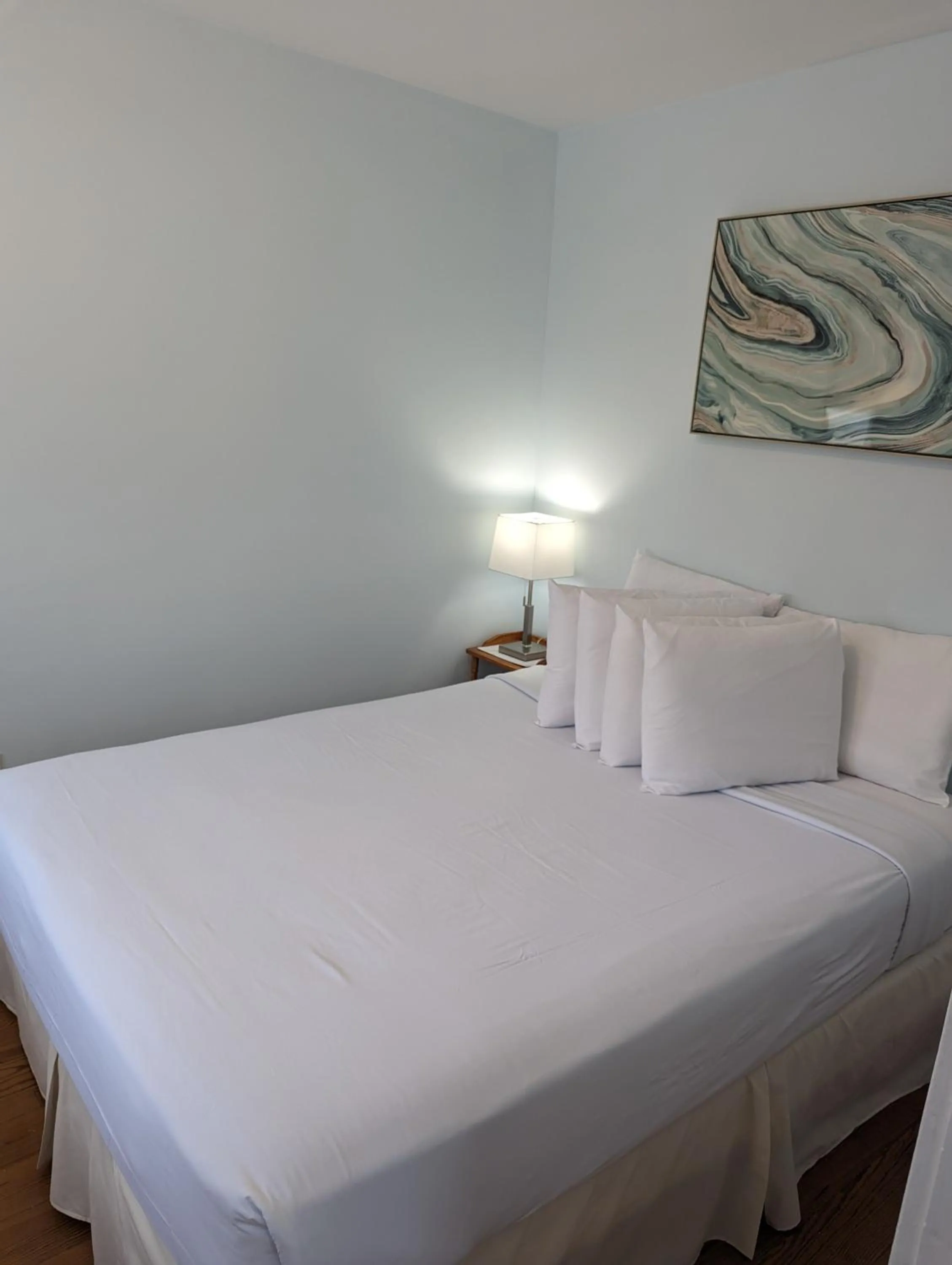 Bed in Daytona Inn and Suites