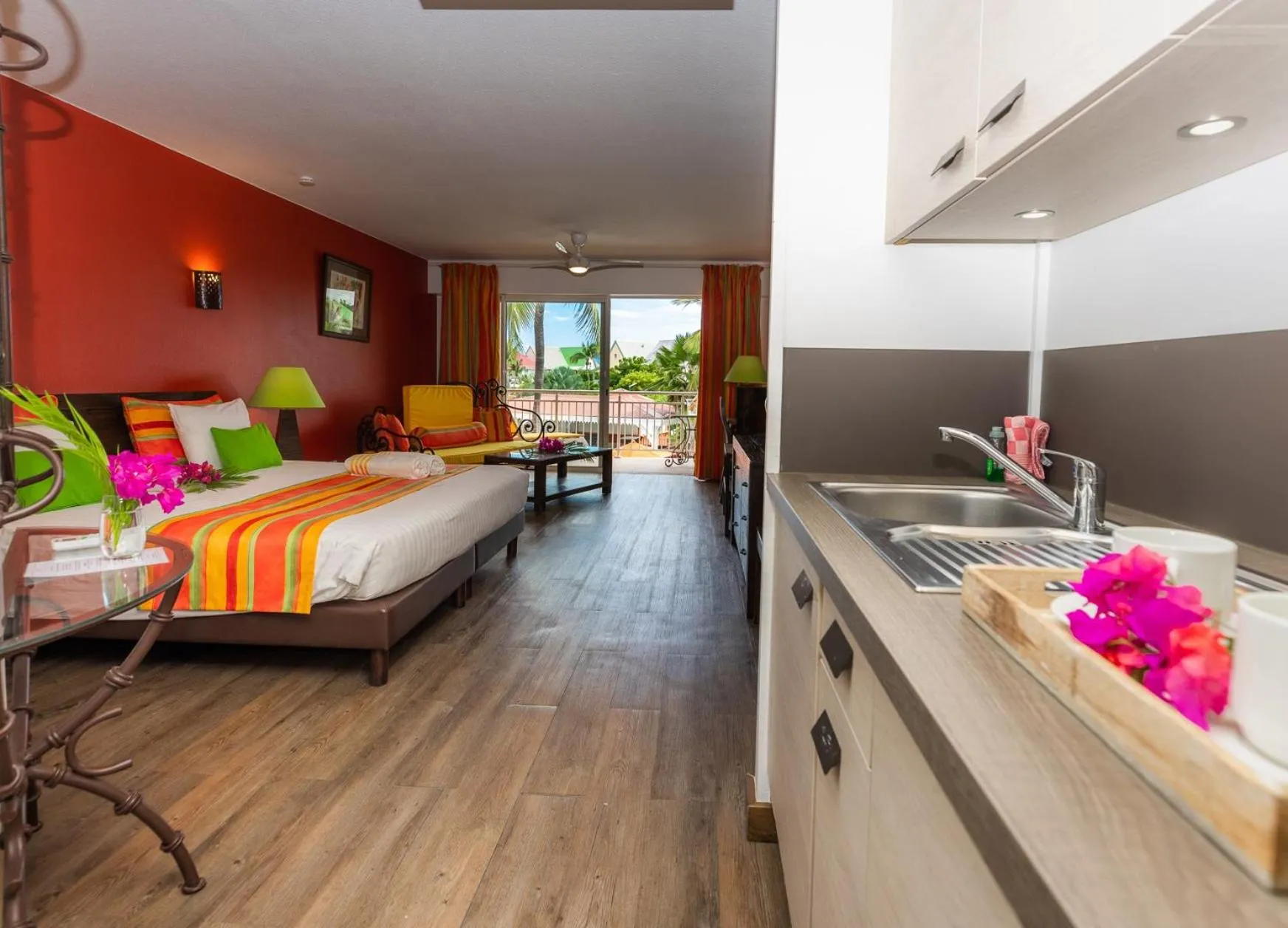 kitchen, Bed in Orient Bay Palm Court Residence 4 Stars