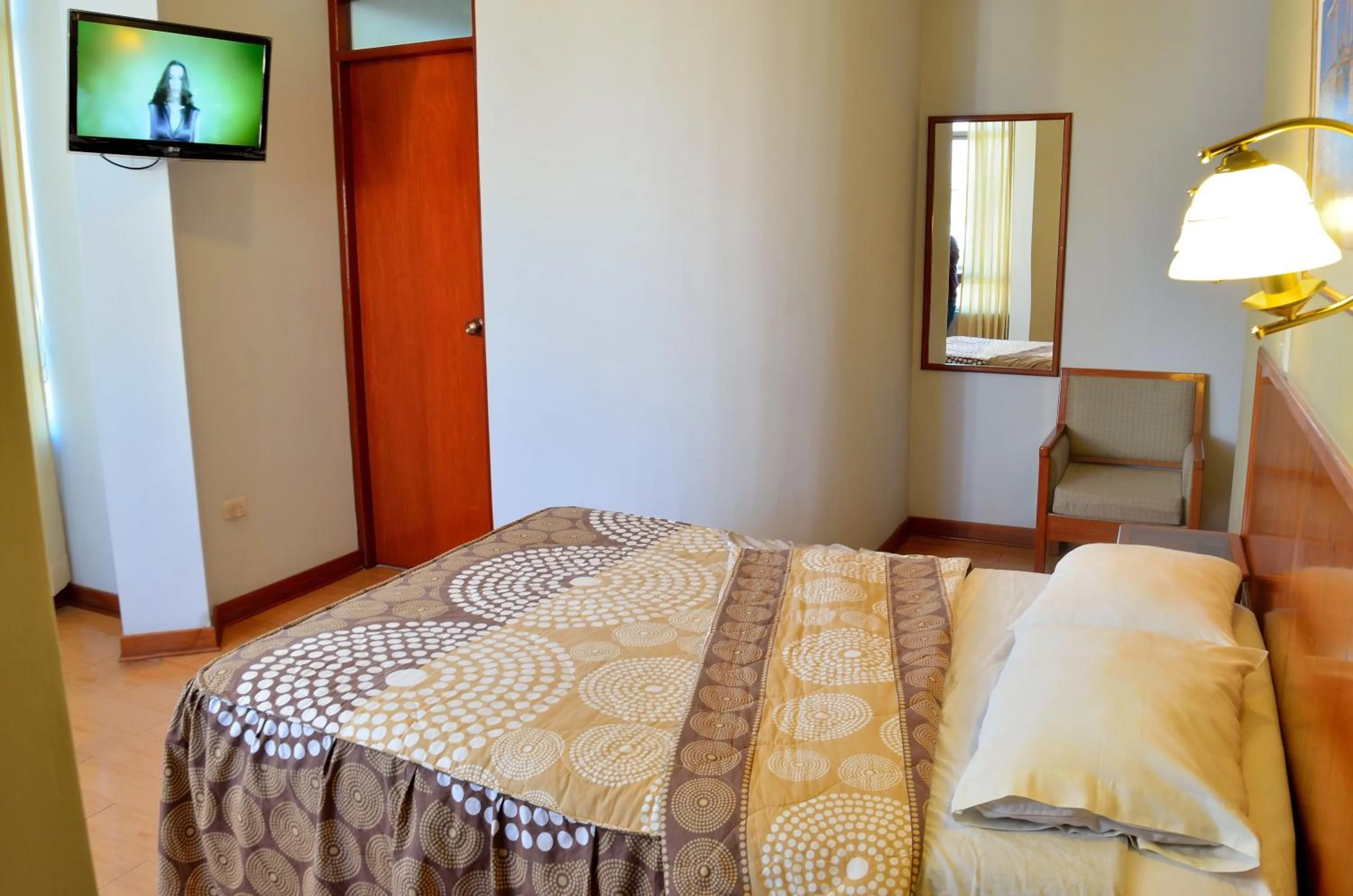 Bed in Primavera Plaza Hotel