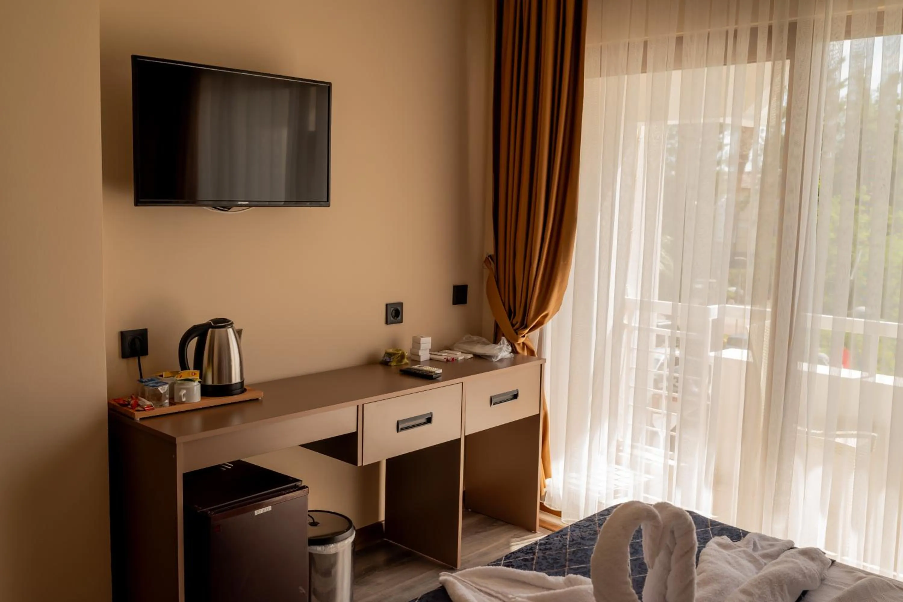 TV and multimedia, TV/Entertainment Center in Arikan Inn Hotel