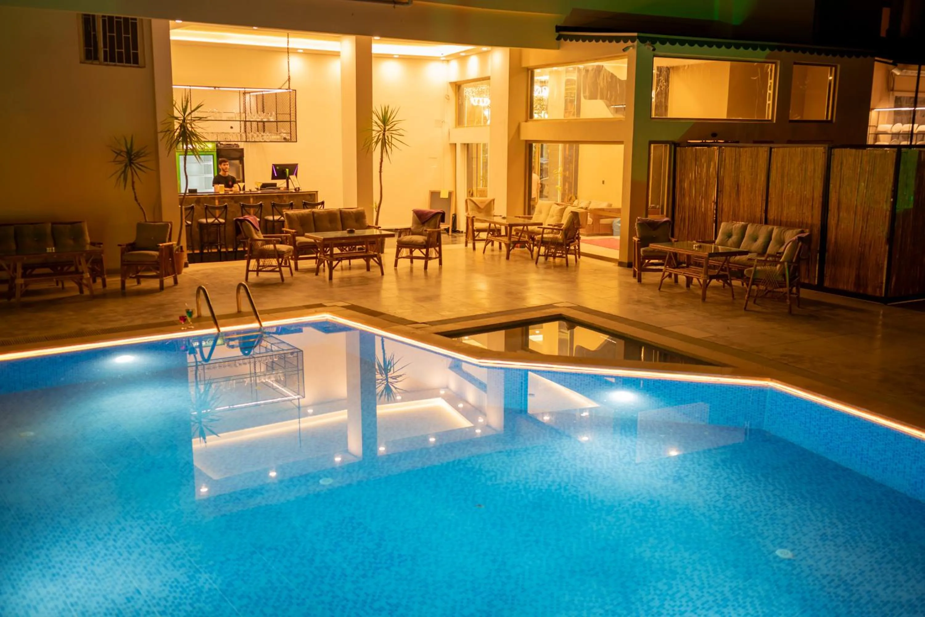 Lounge or bar, Swimming Pool in Arikan Inn Hotel