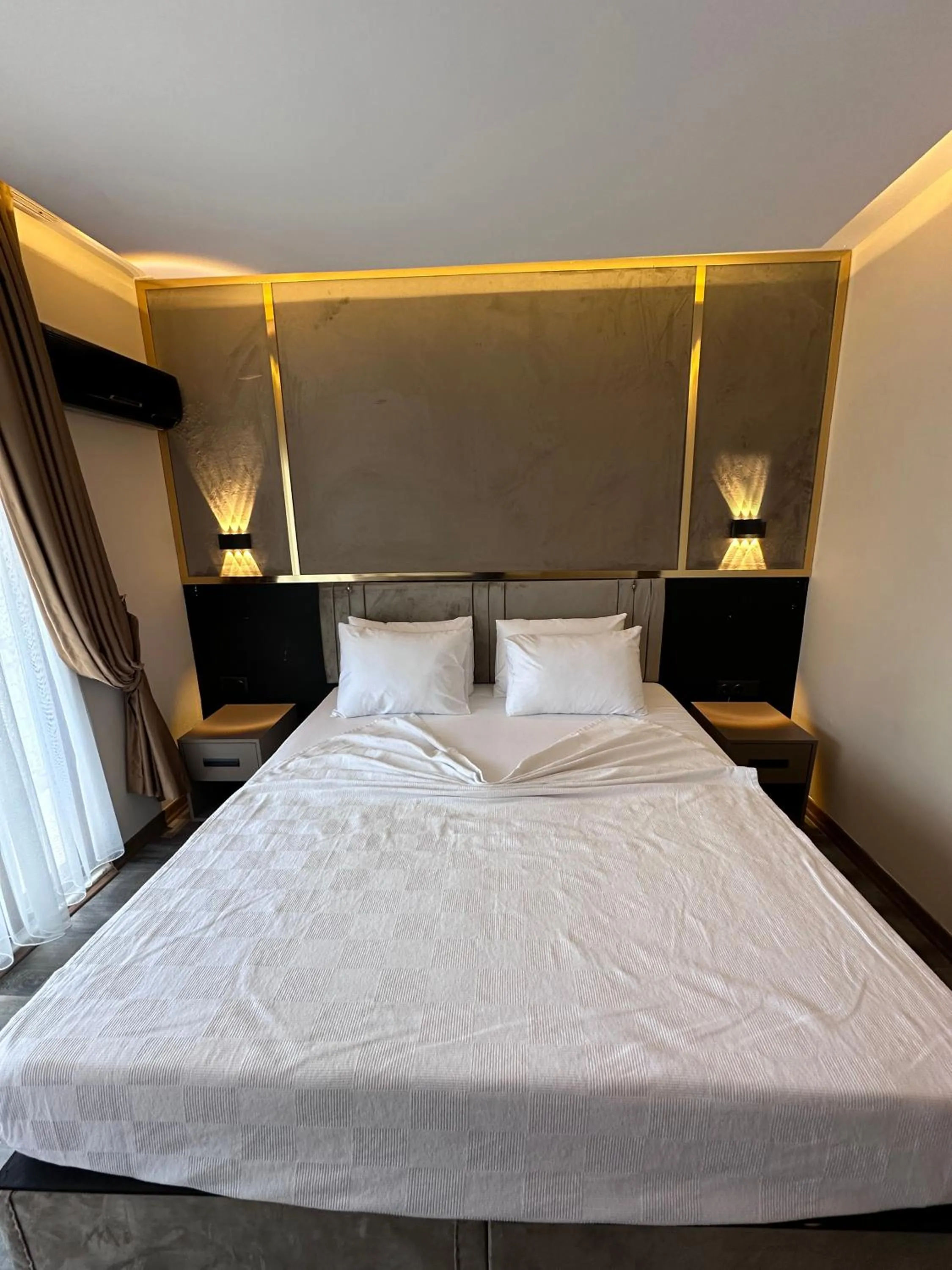 Bed in Arikan Inn Hotel