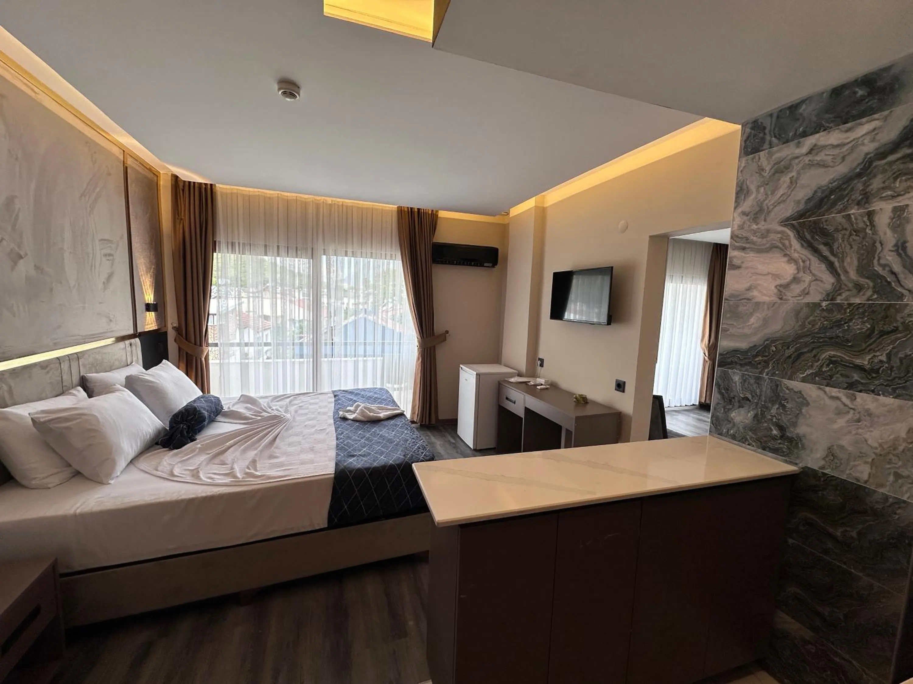 Photo of the whole room, Bed in Vois Kemer Hotel & SPA