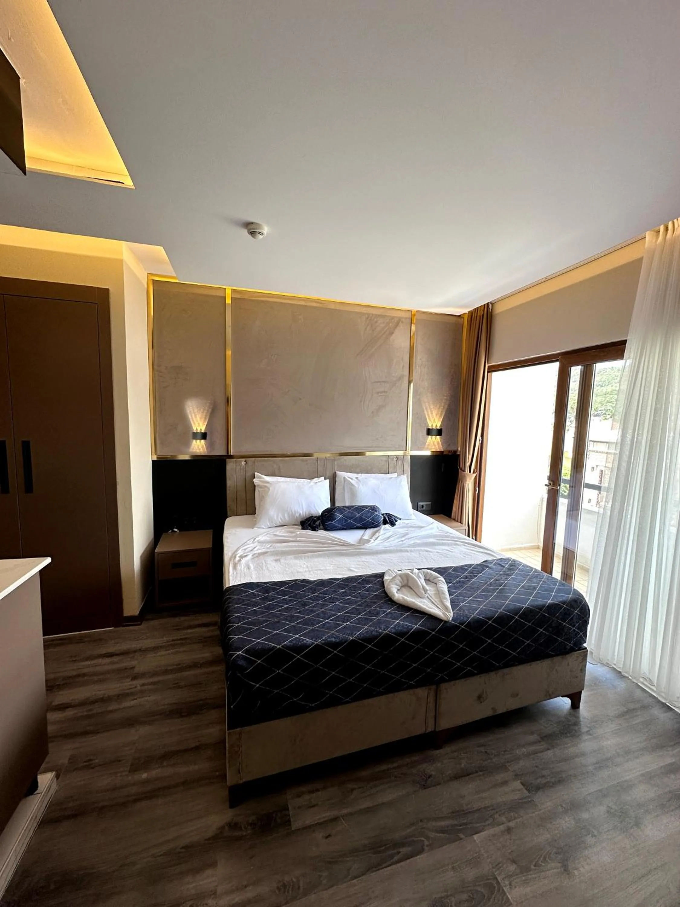 Photo of the whole room, Bed in Vois Kemer Hotel & SPA