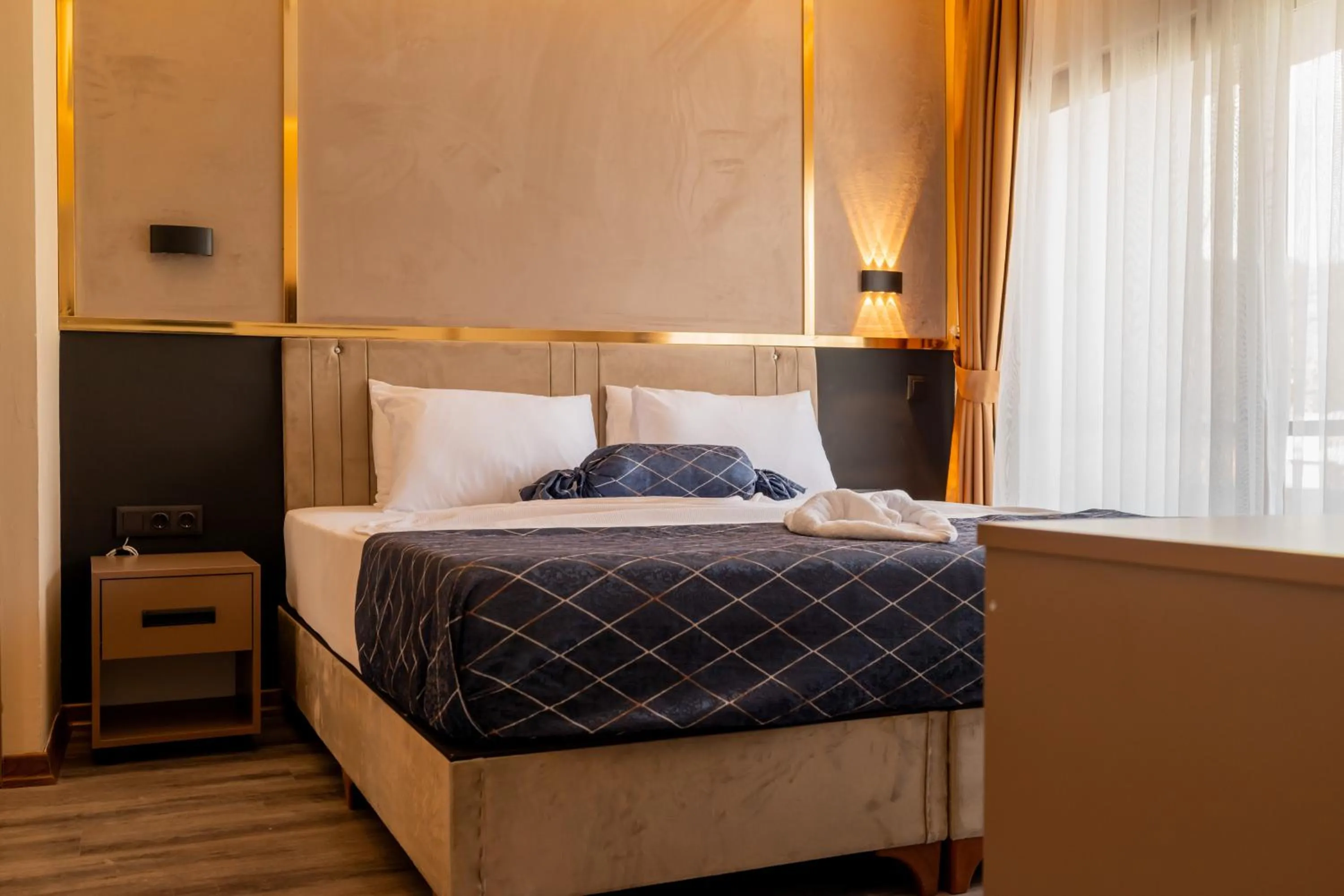 Photo of the whole room, Bed in Vois Kemer Hotel & SPA