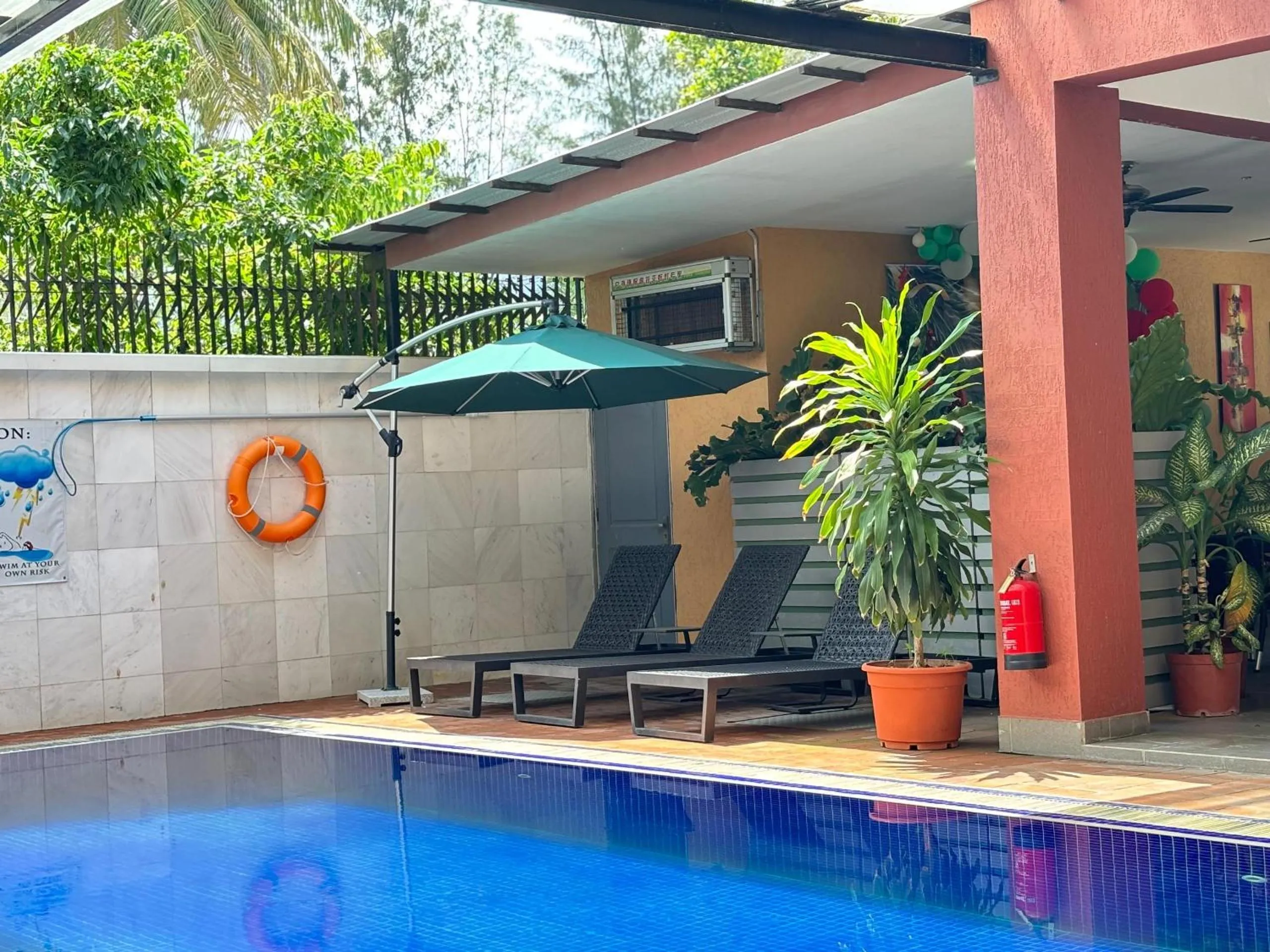 Swimming pool in Palm Beach Hotel Dili