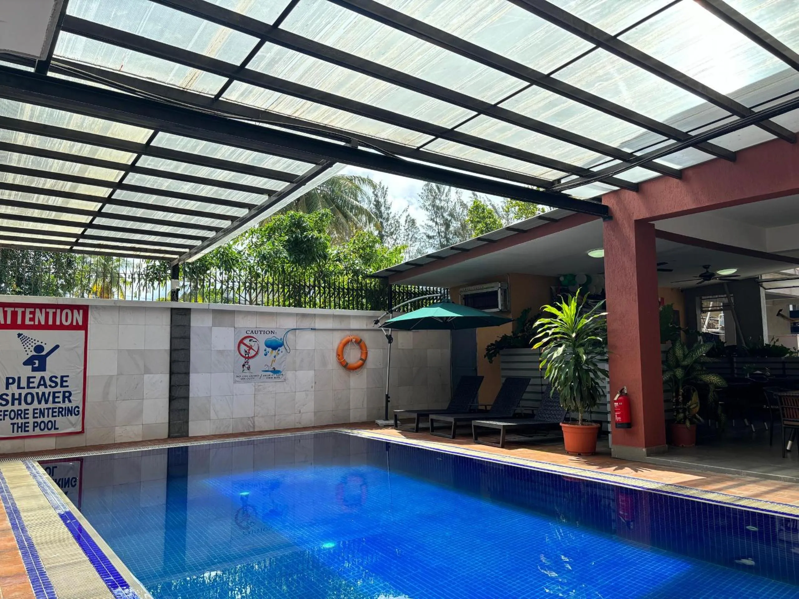 Swimming pool in Palm Beach Hotel Dili