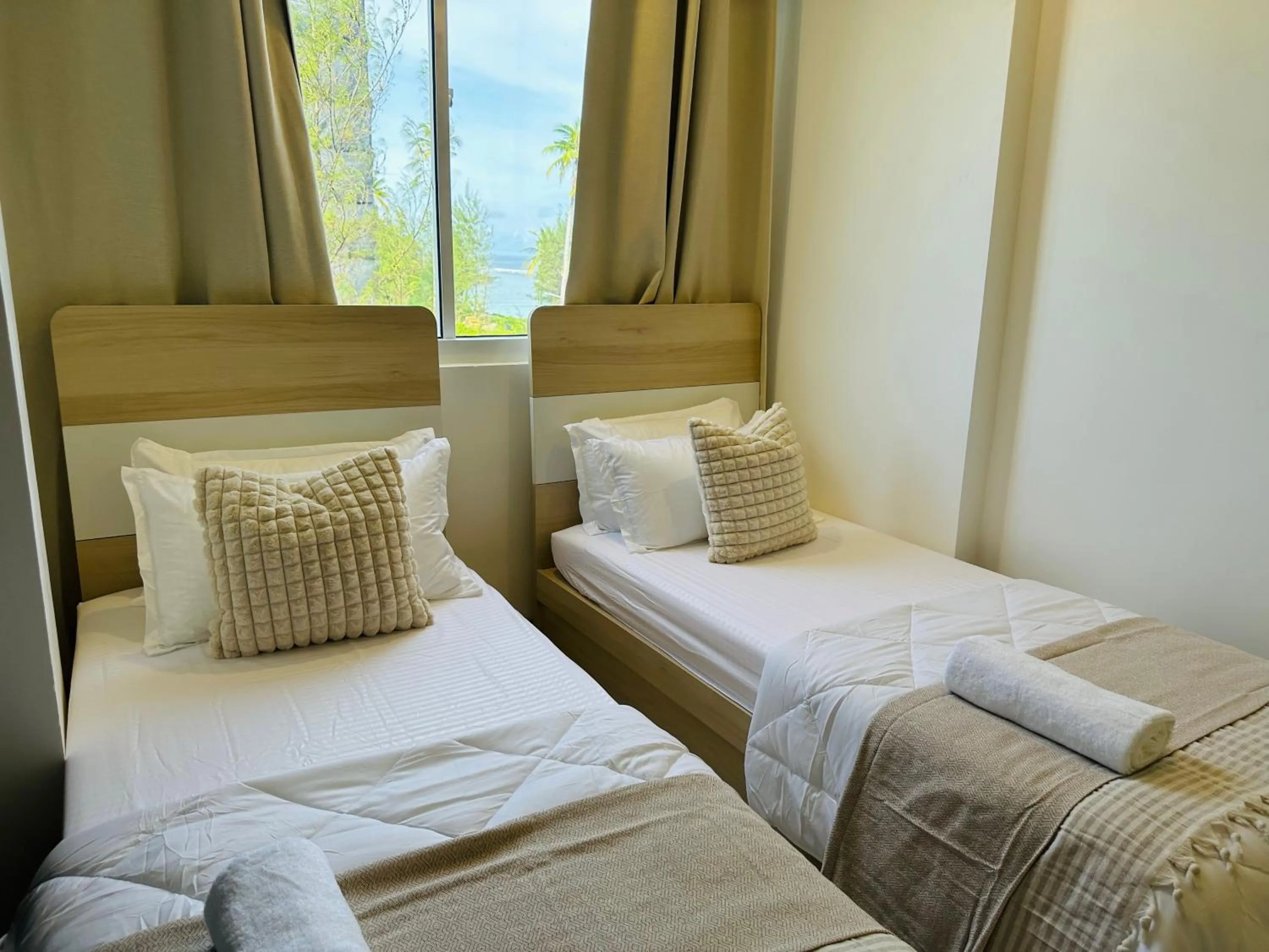 Bed in Lazzlla beach front apartments