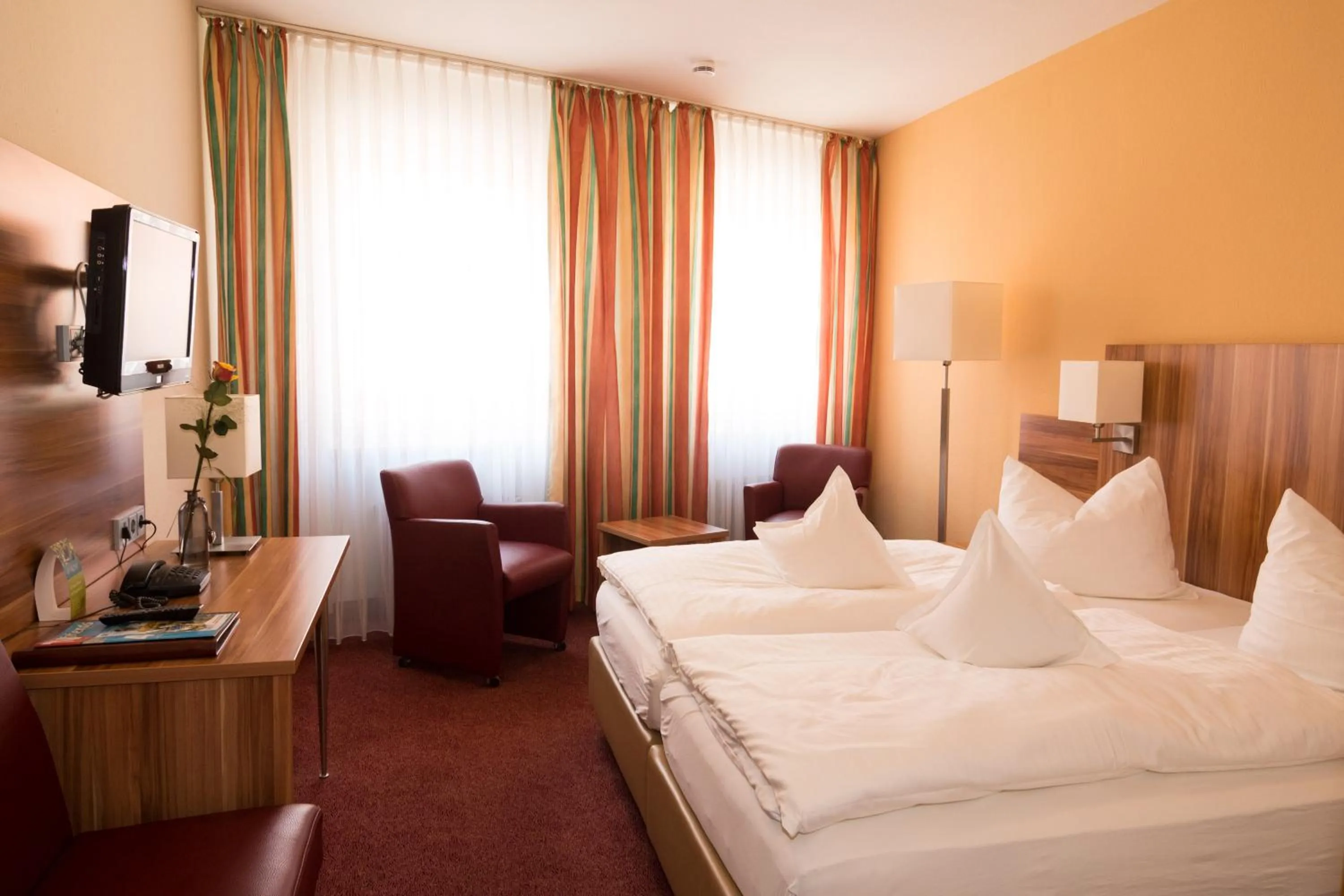 Photo of the whole room, Bed in Weinhotel Rose