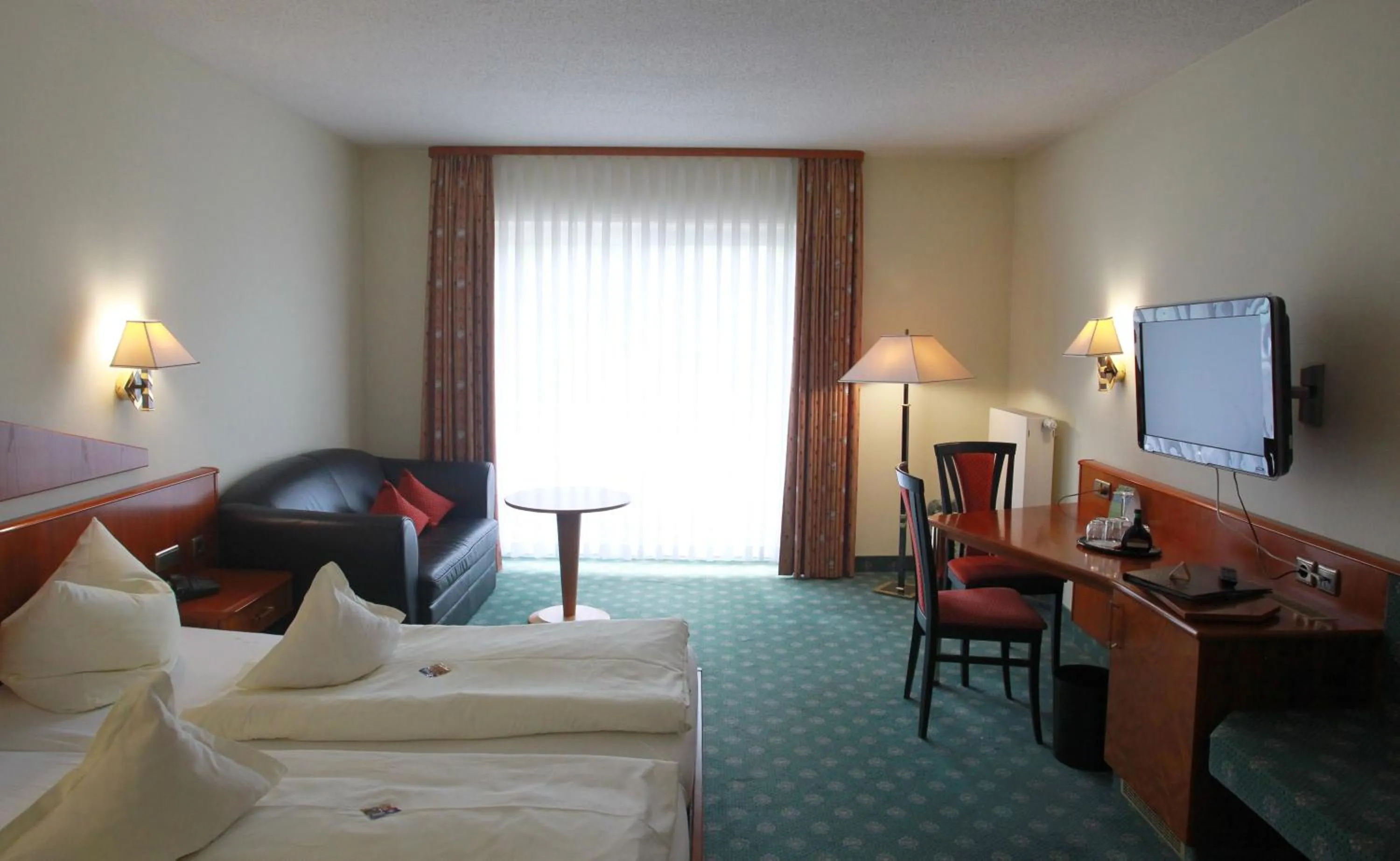 Photo of the whole room, Bed in Weinhotel Rose