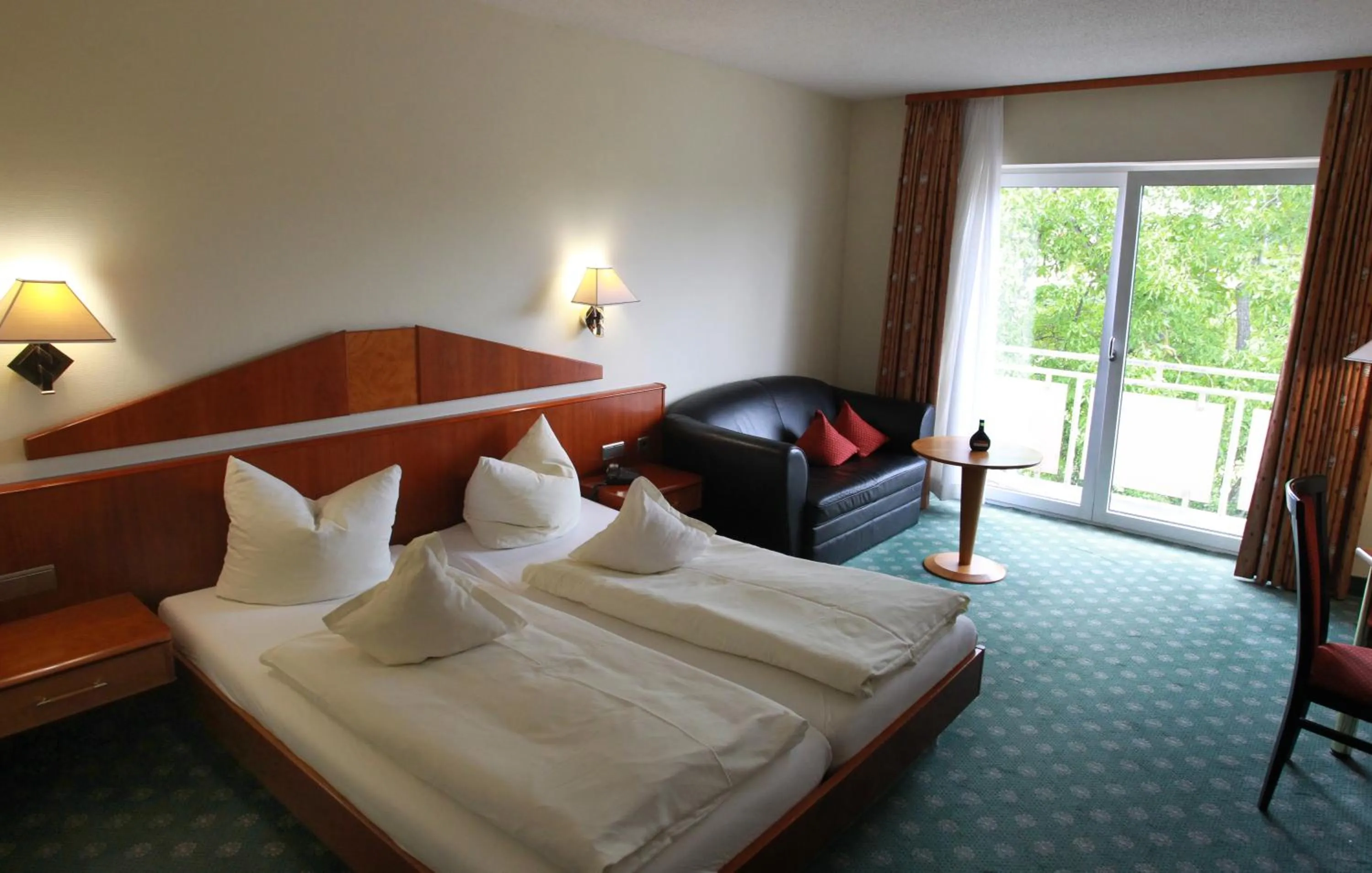 Bed in Weinhotel Rose