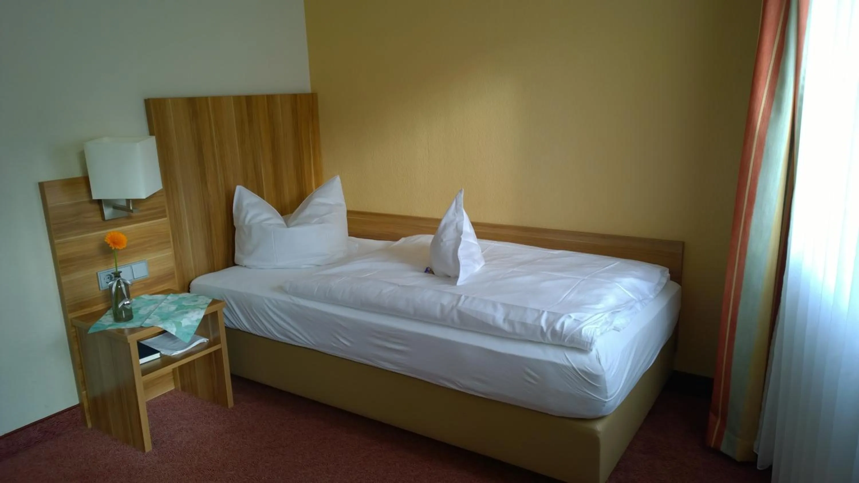 Bed in Weinhotel Rose