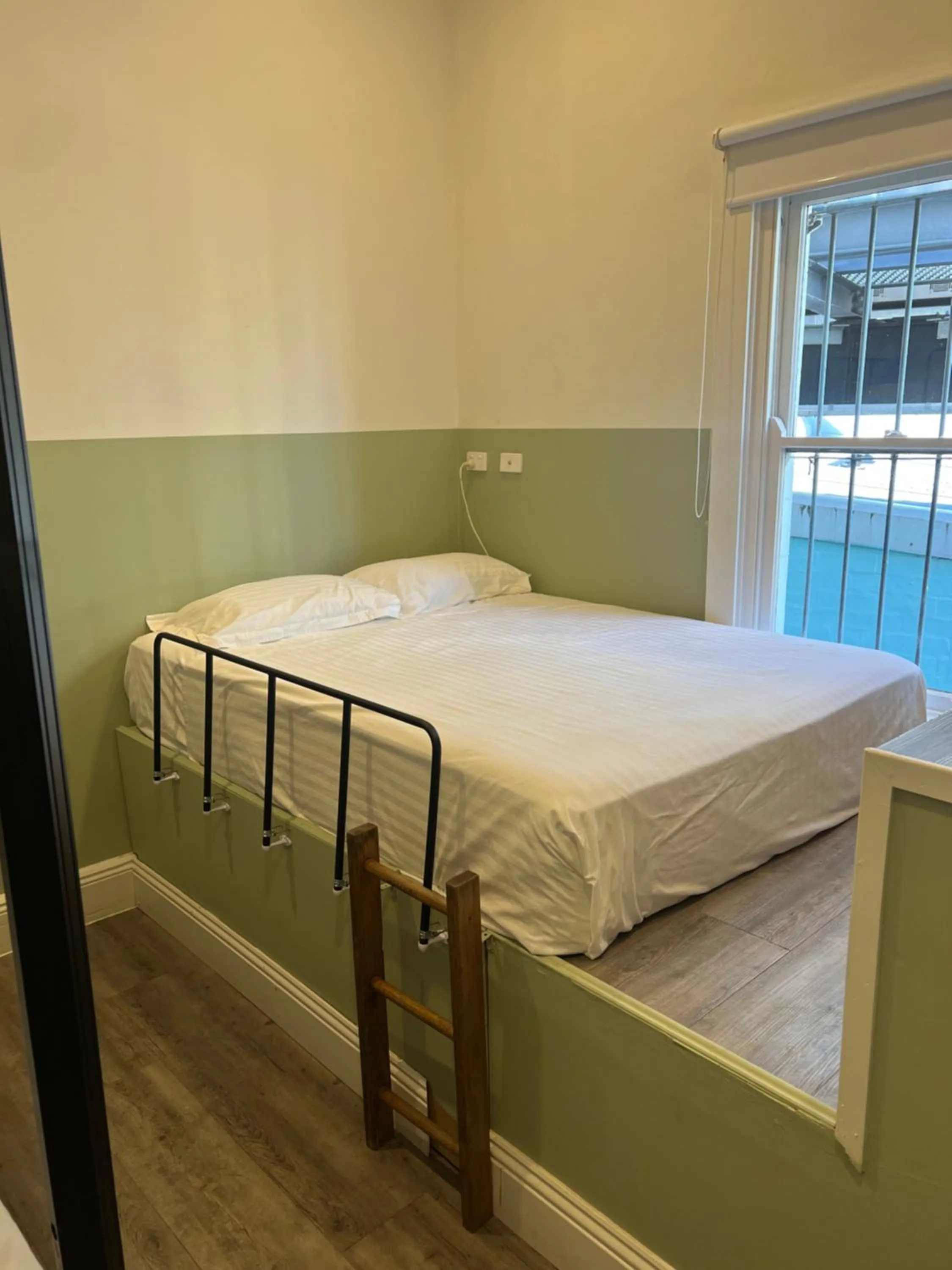 Bed in Native Rose Hotel