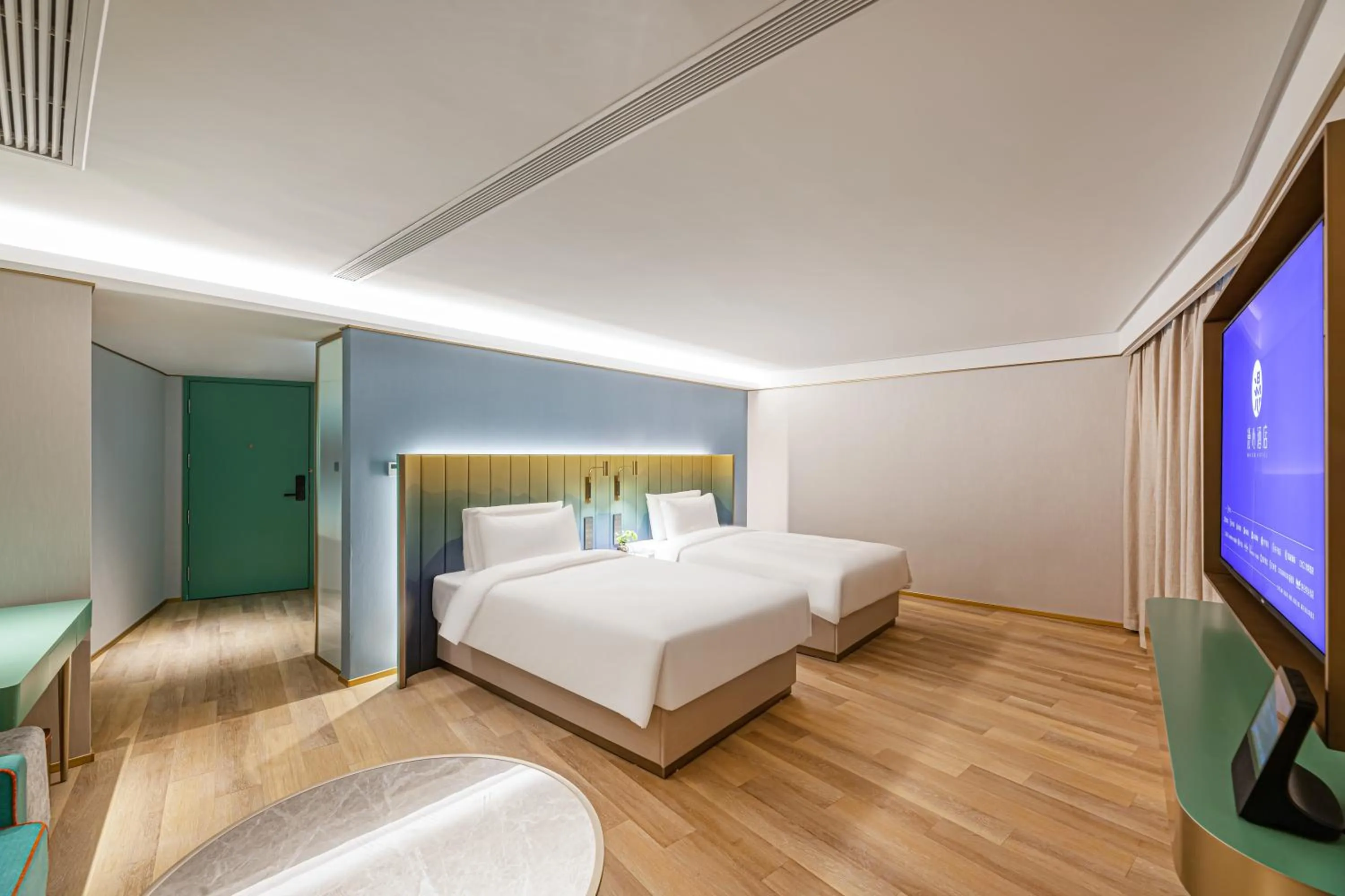 Photo of the whole room, Bed in Zhangjiagang Pedestrian Street Manxin Hotel