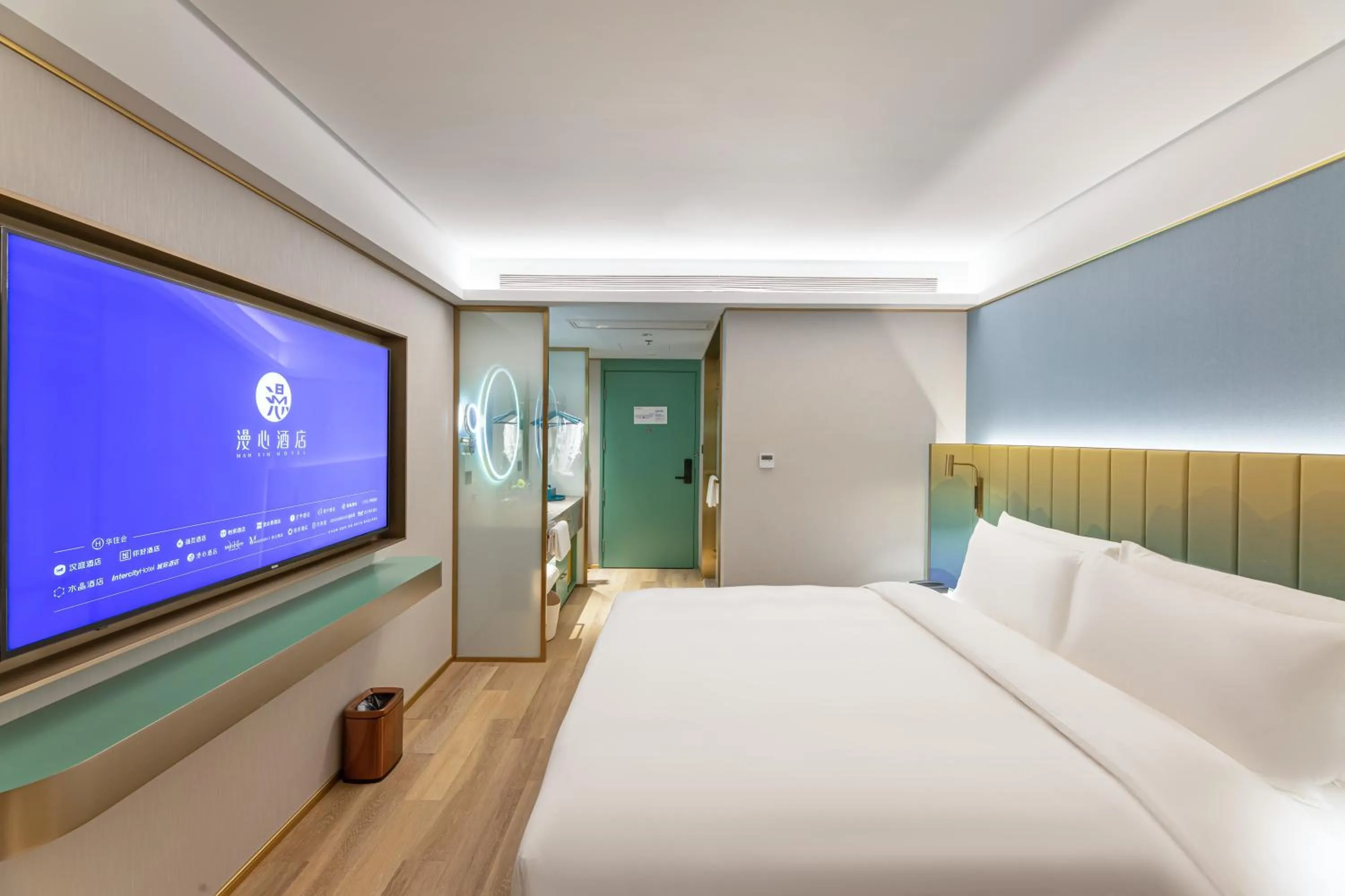 Photo of the whole room, Bed in Zhangjiagang Pedestrian Street Manxin Hotel