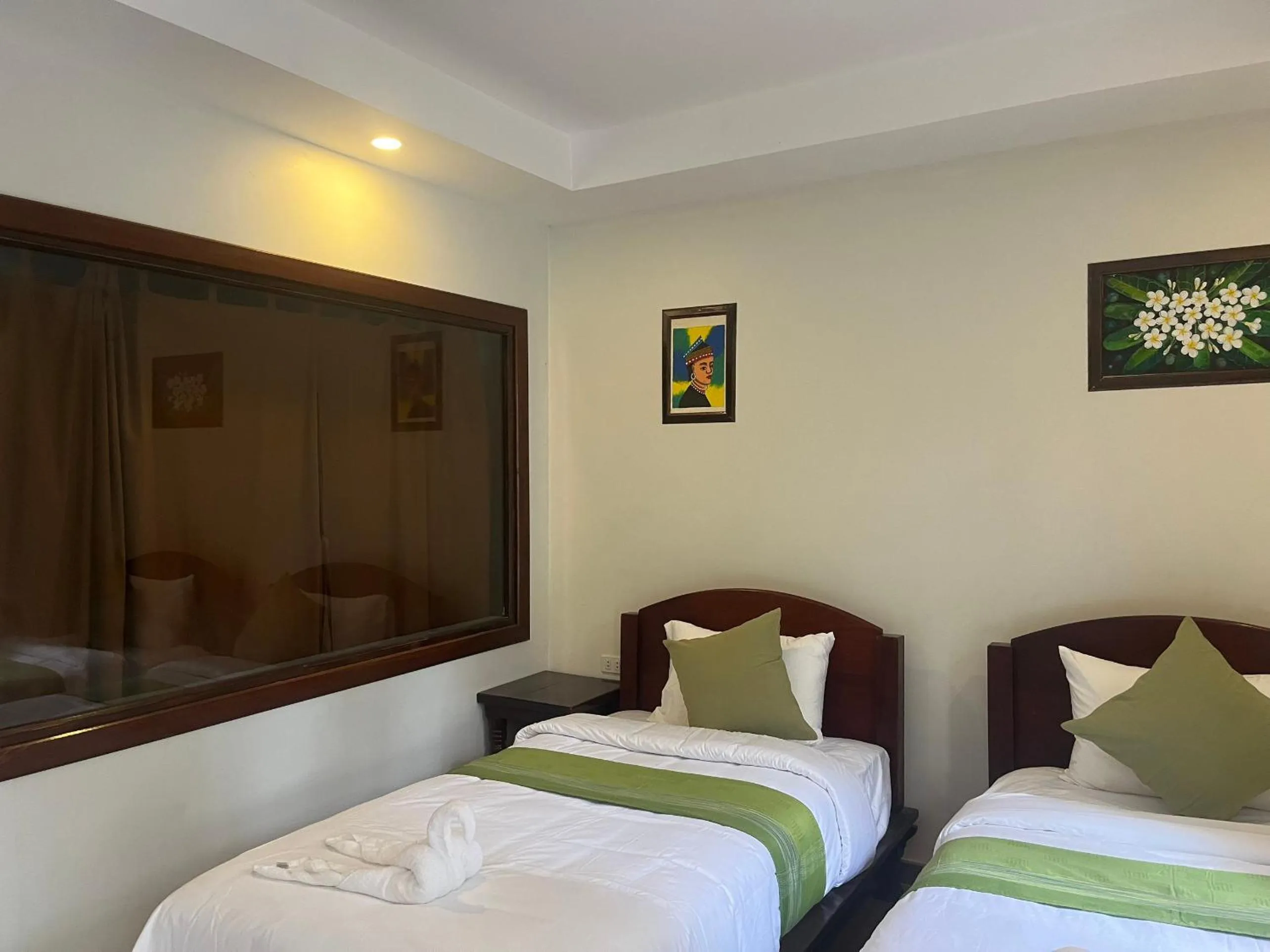 Bed in Villa Namkhan Heritage