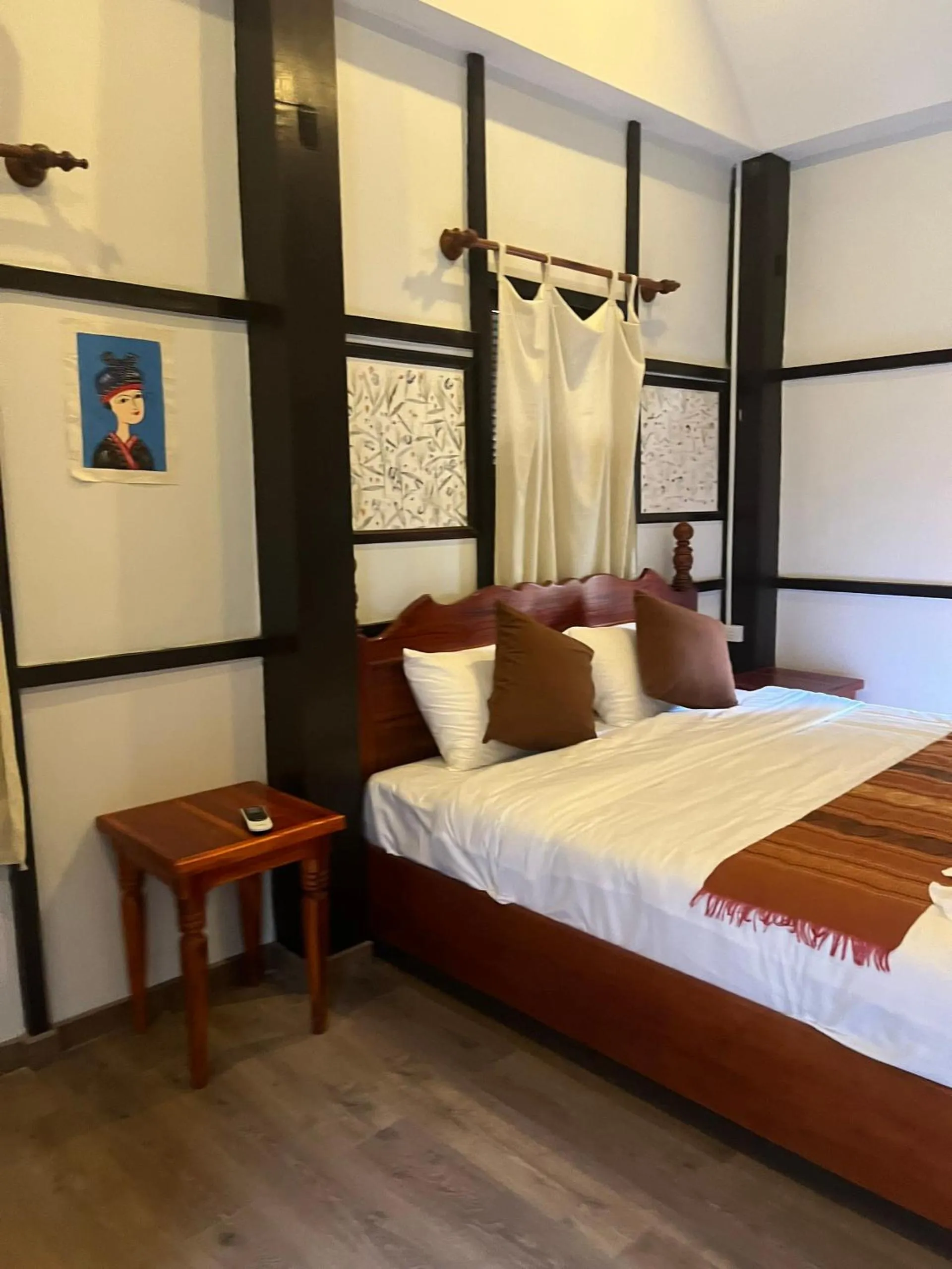 Bed in Villa Namkhan Heritage