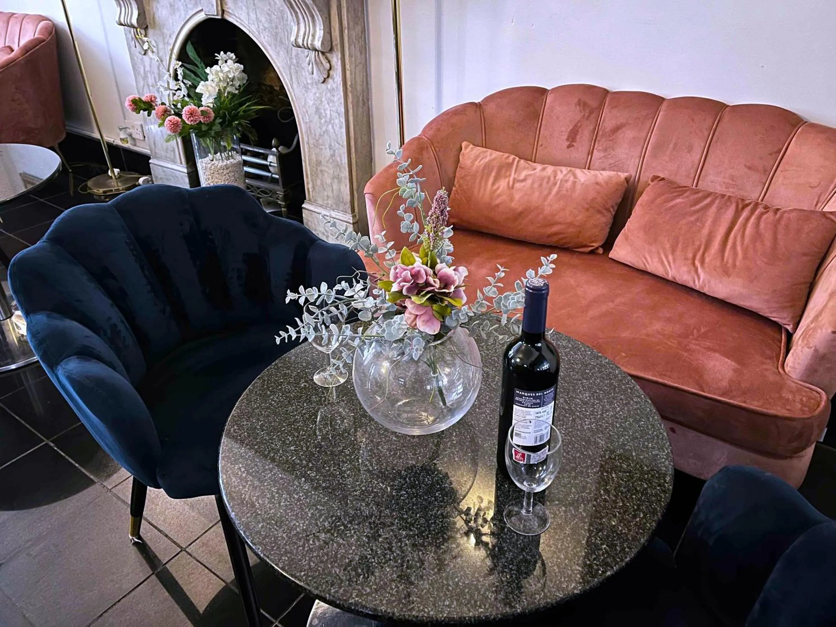 Communal lounge/ TV room in My Place Hotel