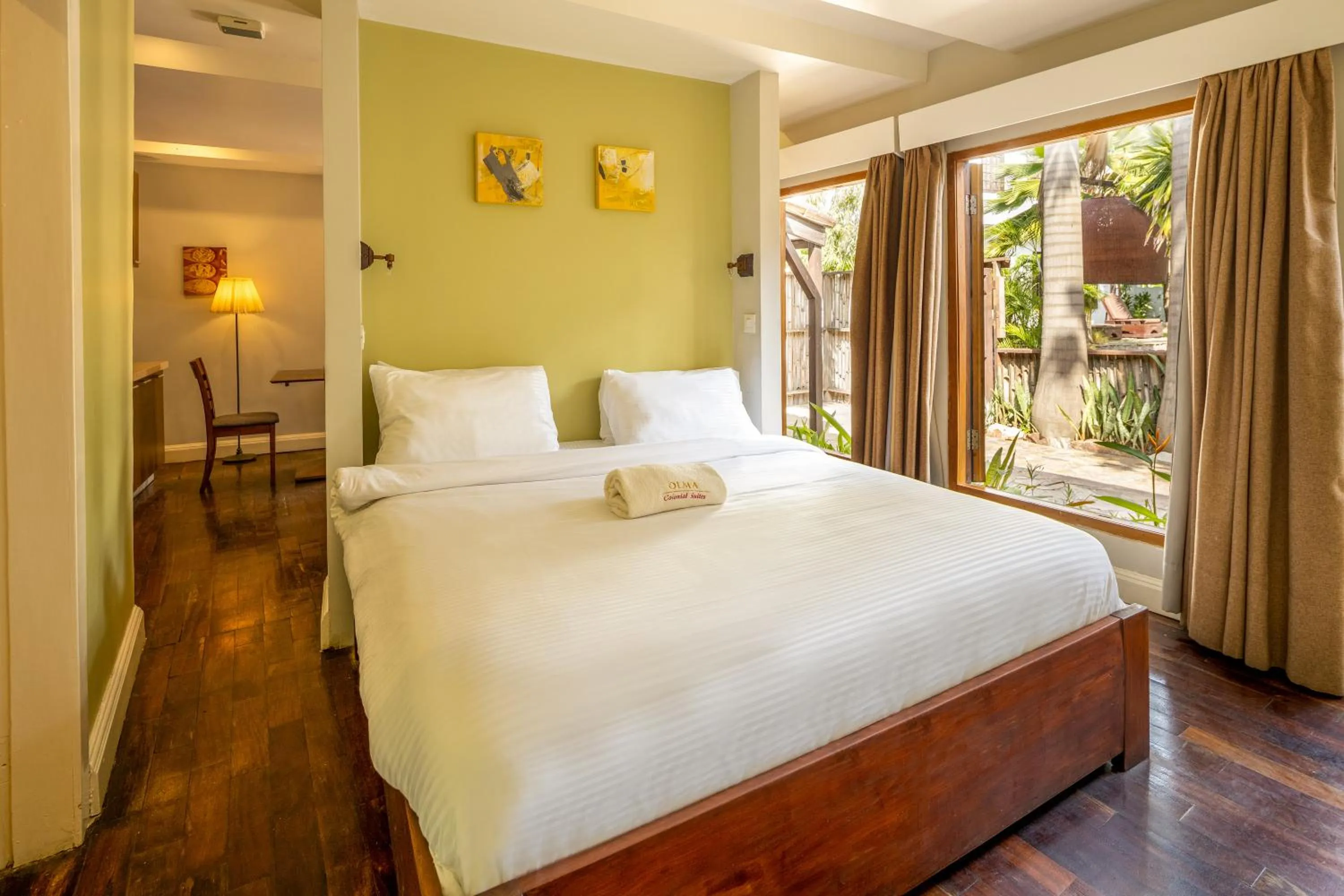 Bed in Olma Hotel & Suites