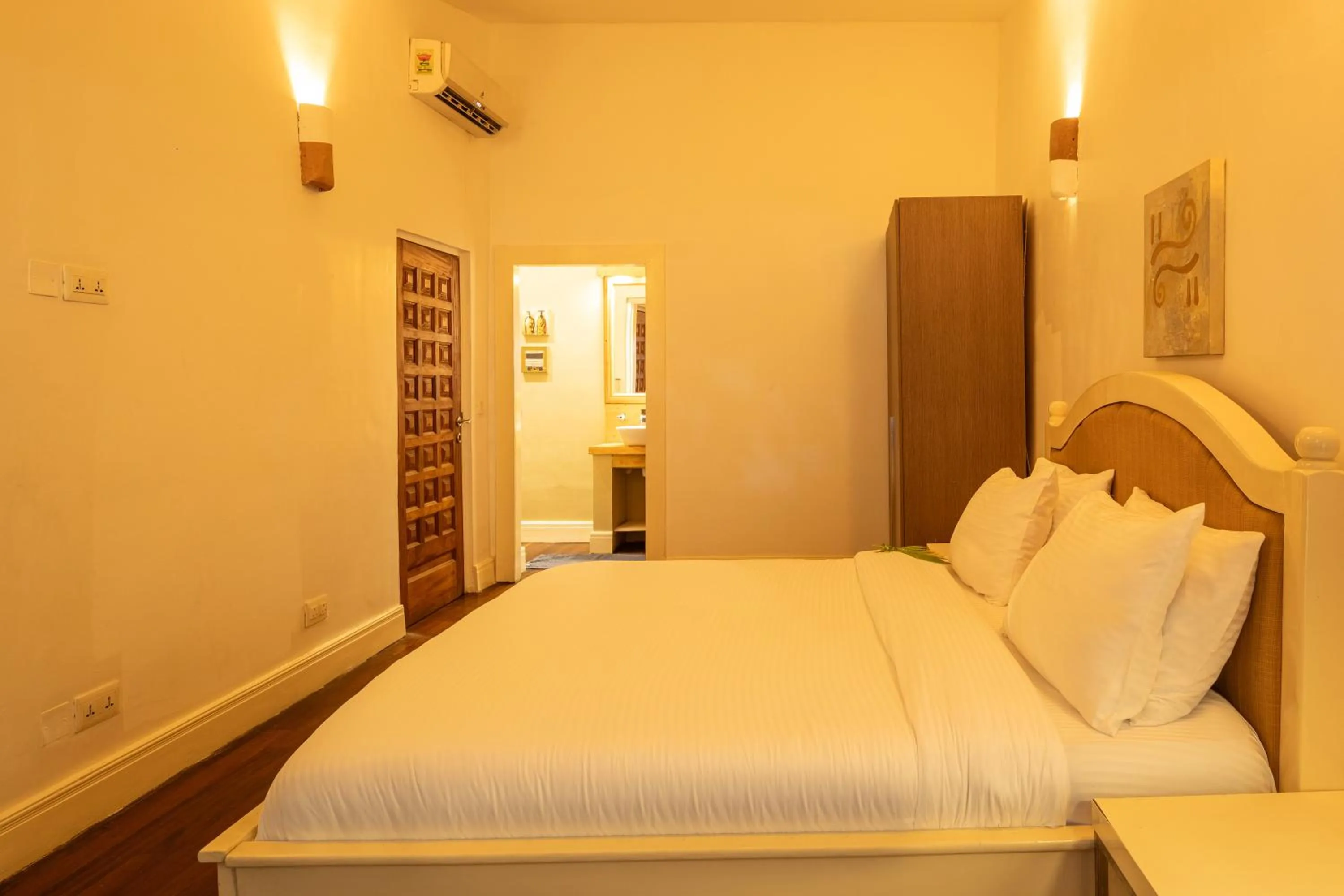 Bed in Olma Hotel & Suites