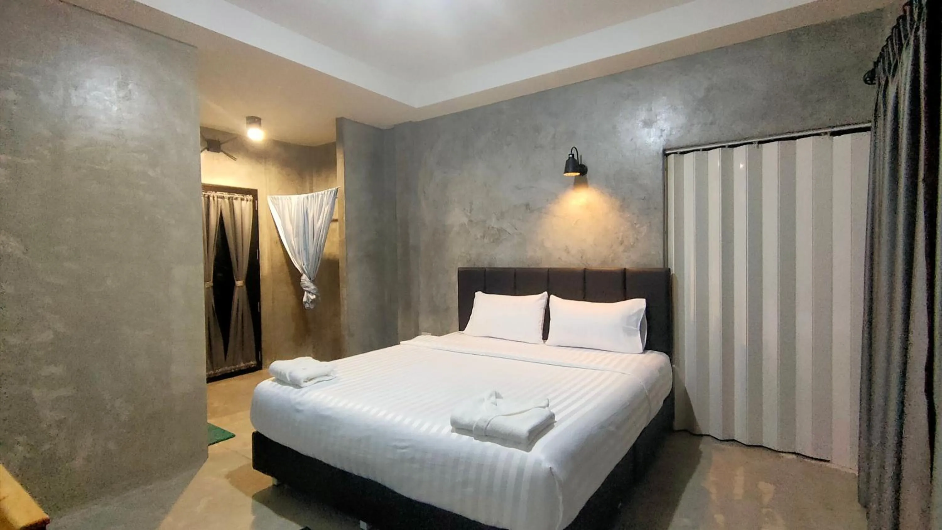 Bed in The Loftel Resort