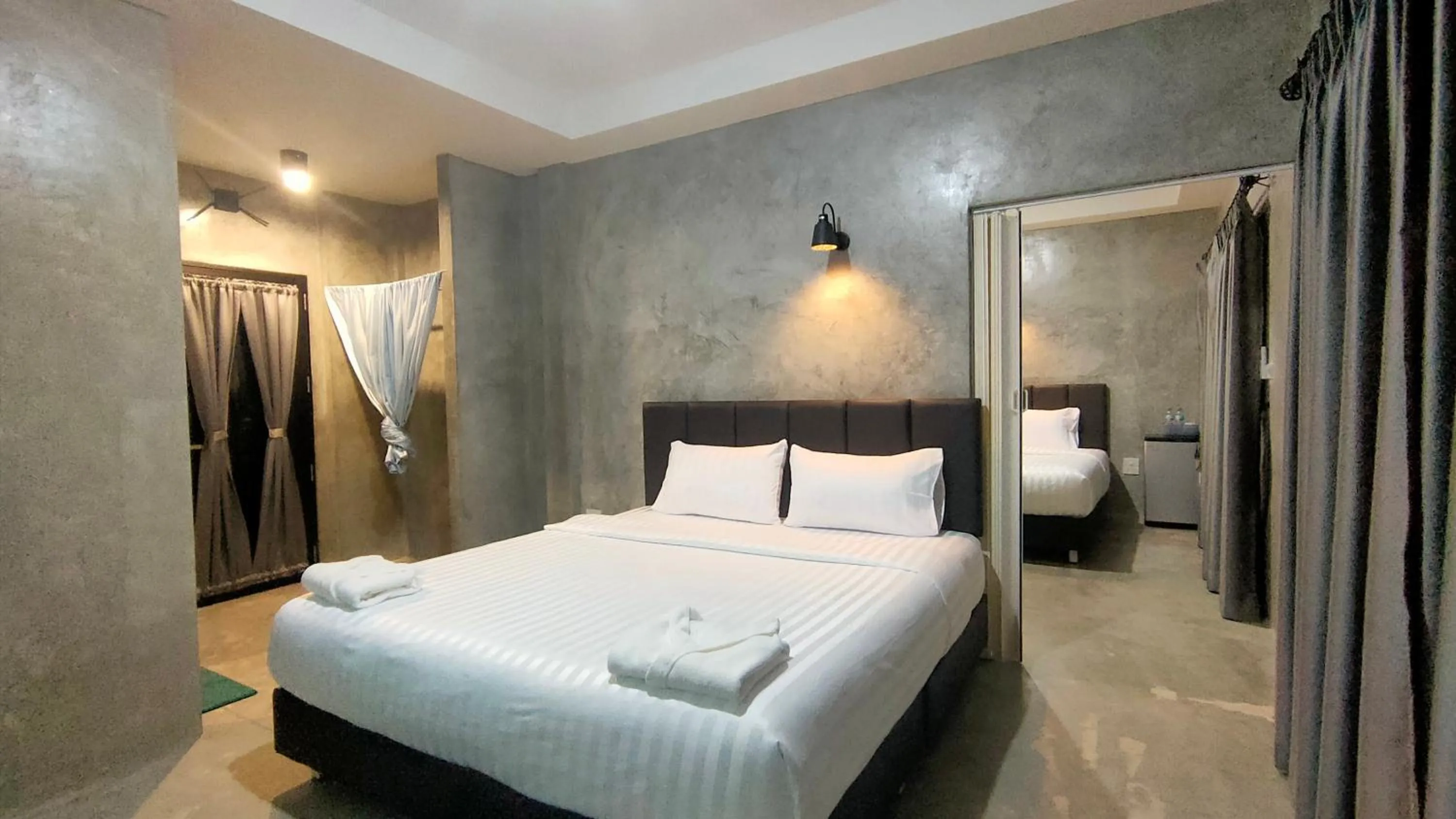 Bed in The Loftel Resort