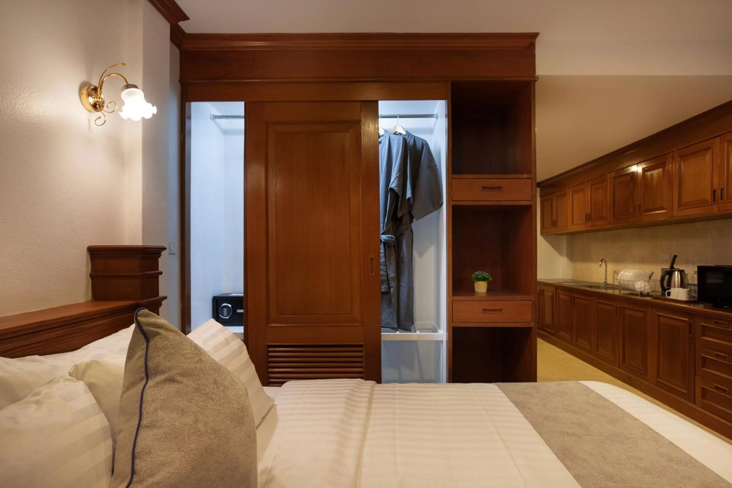 Kitchen or kitchenette, Bed in Aspira Resort Klong Muang Krabi