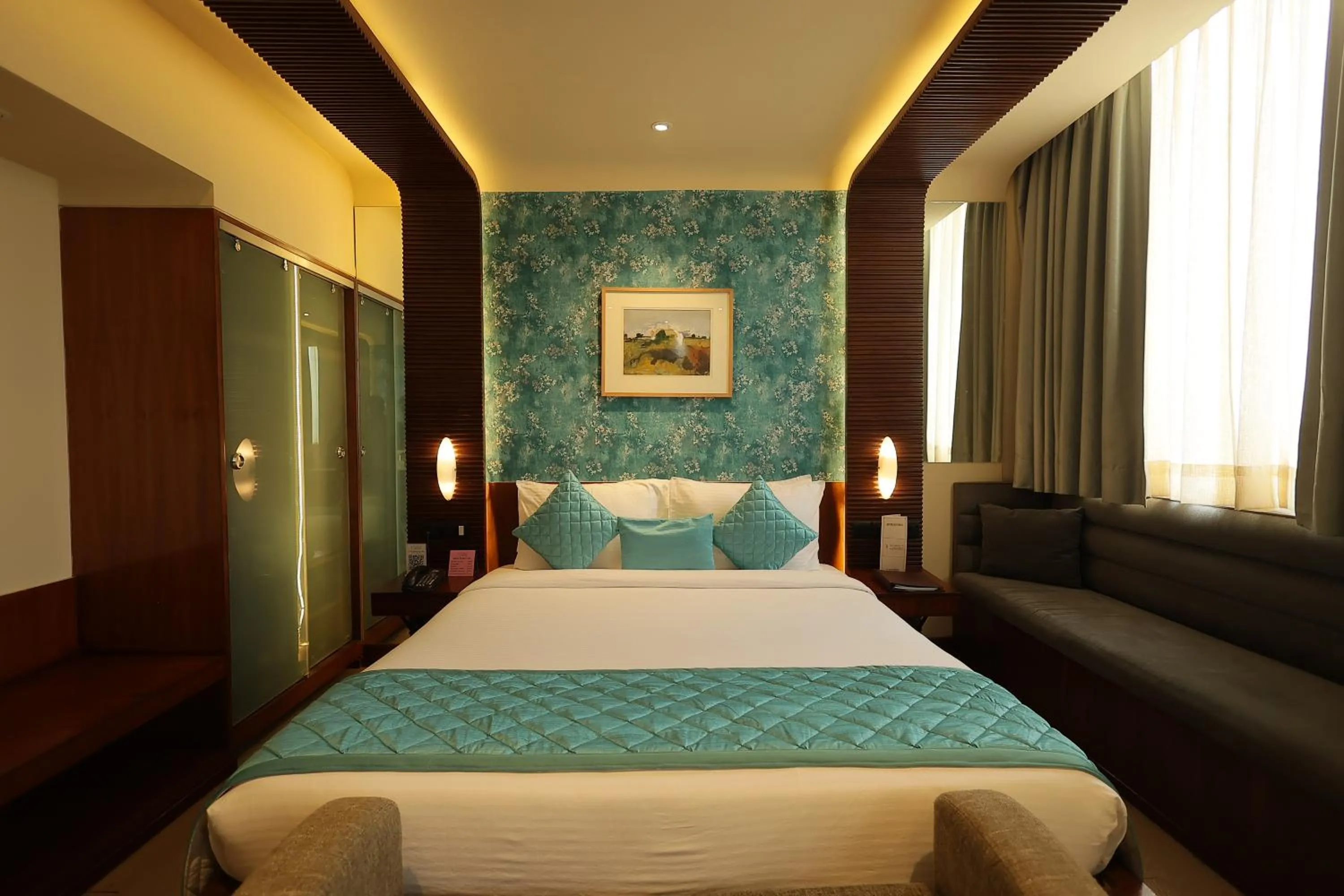 Bed in Regenta Orkos Kolkata by Royal Orchid Hotels Limited