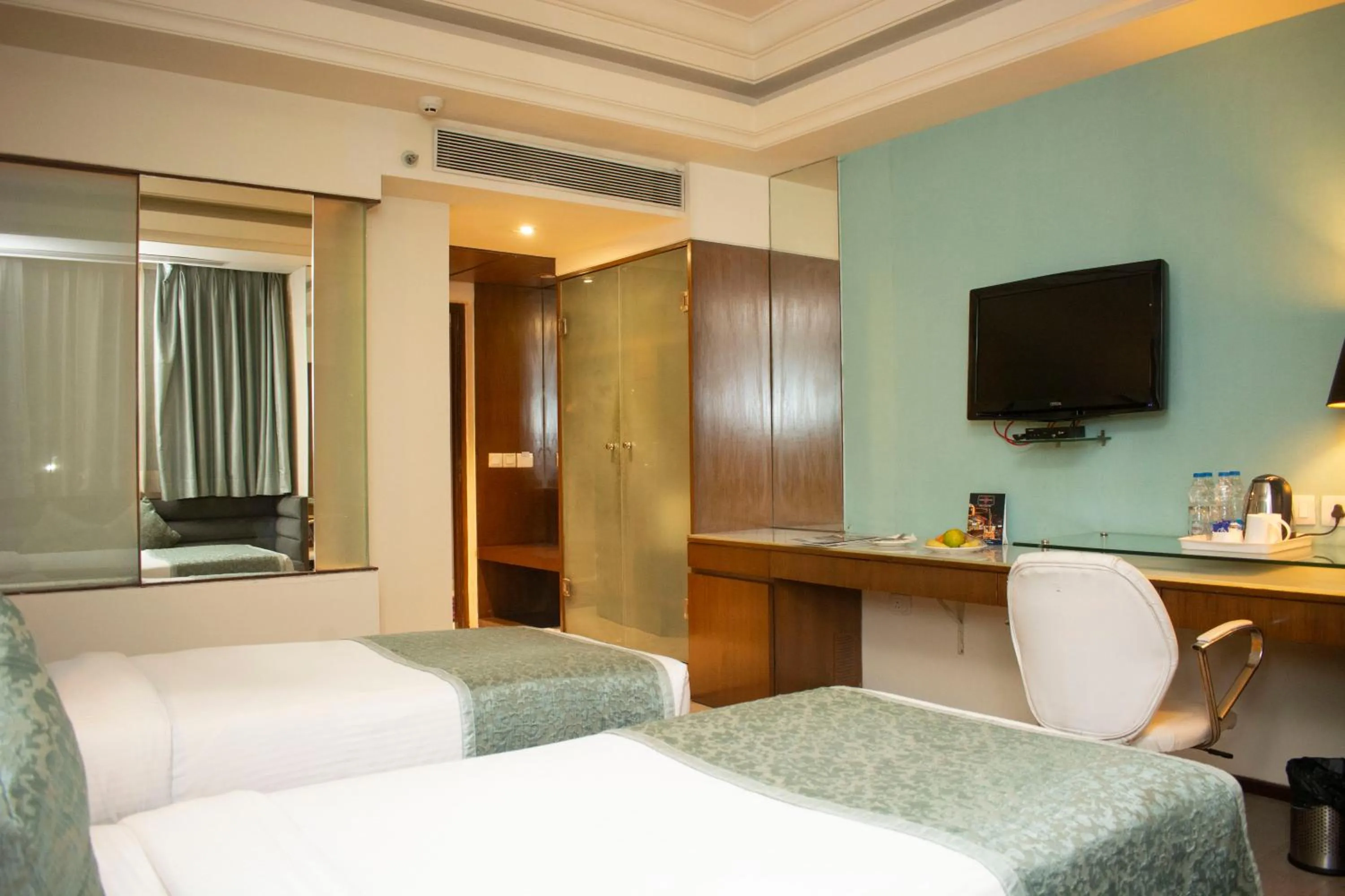 Bed in Regenta Orkos Kolkata by Royal Orchid Hotels Limited