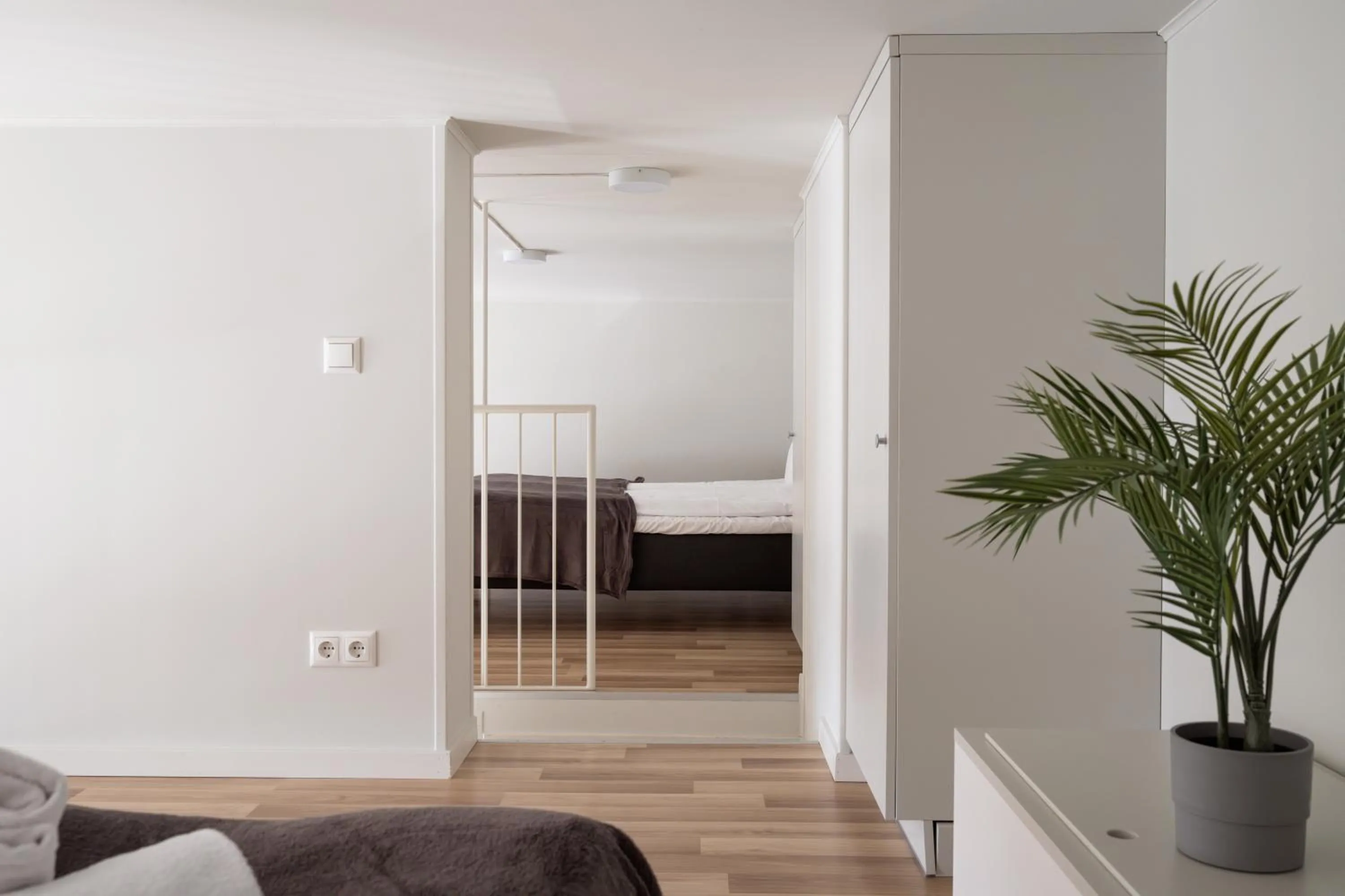 Bed in Waterfront Cabins