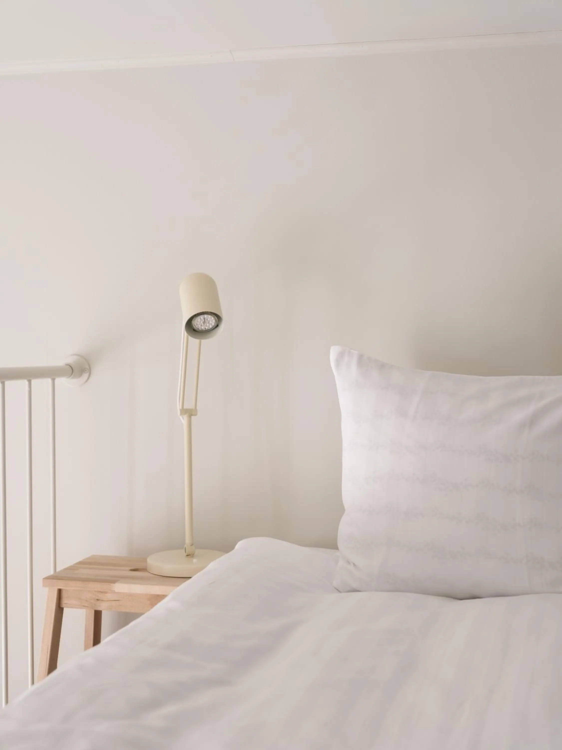 Bed in Waterfront Cabins