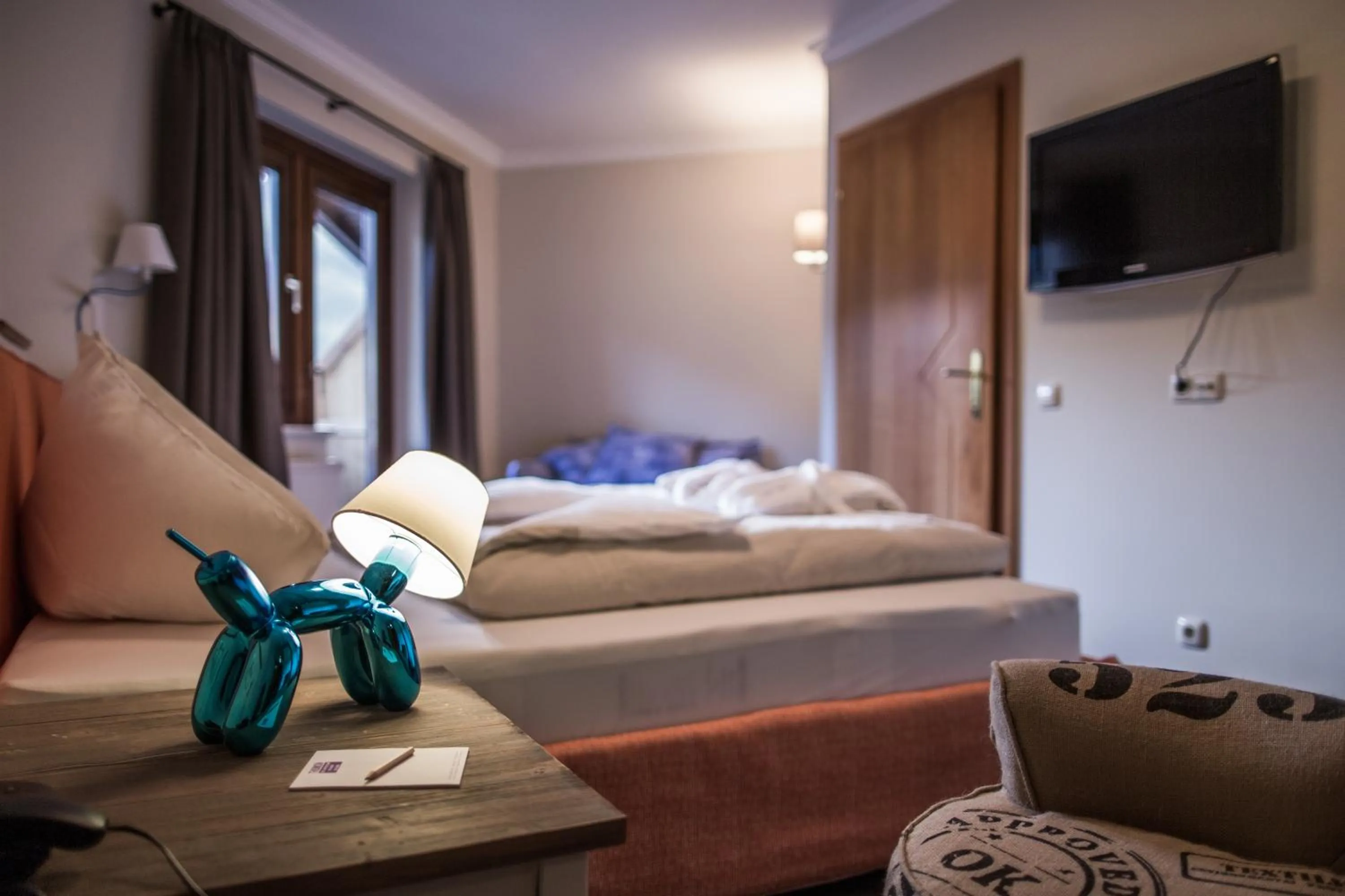 Photo of the whole room, Bed in THOMSN Central Hotel & Appartements