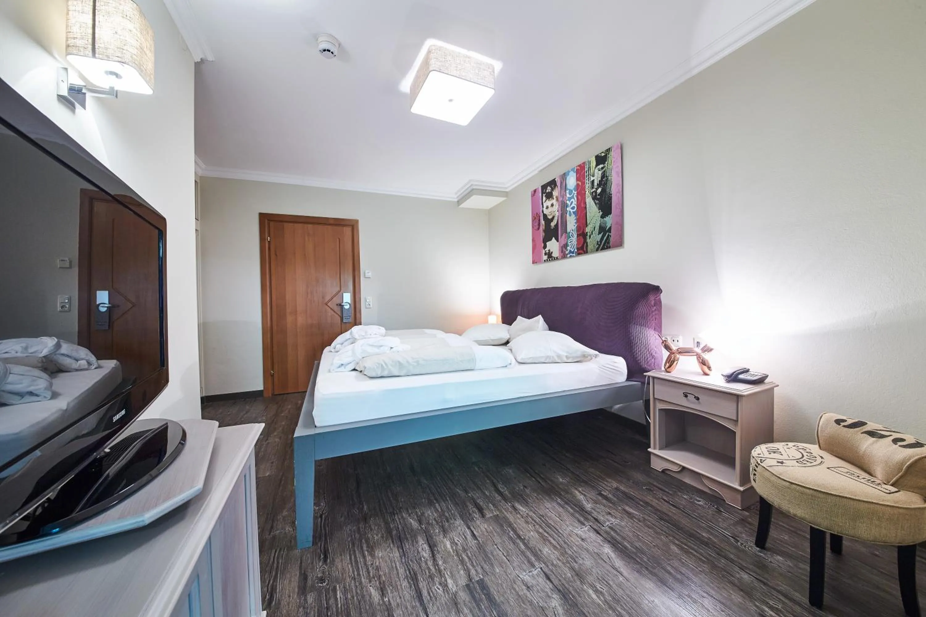 Photo of the whole room, Bed in THOMSN Central Hotel & Appartements