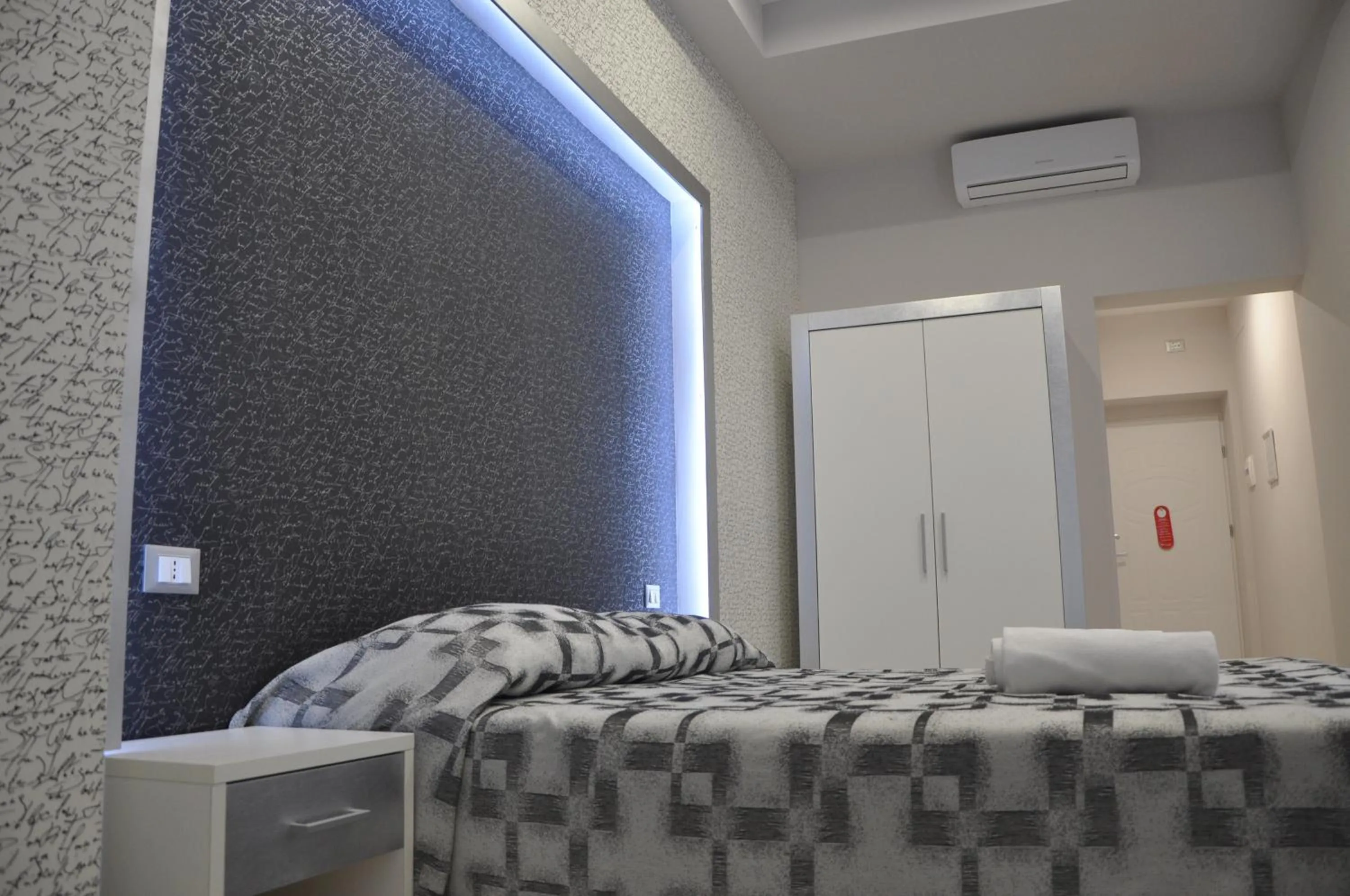 Bed in Il Corso Suite