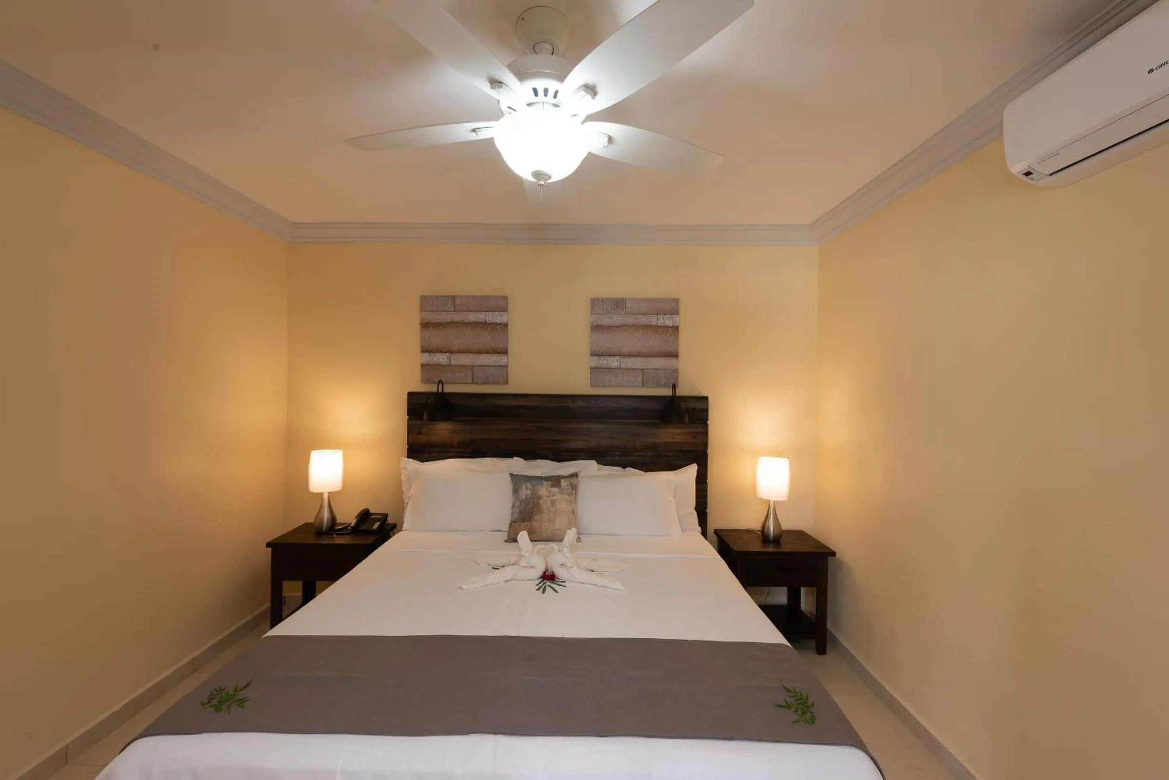 Photo of the whole room, Bed in Baker's Suites