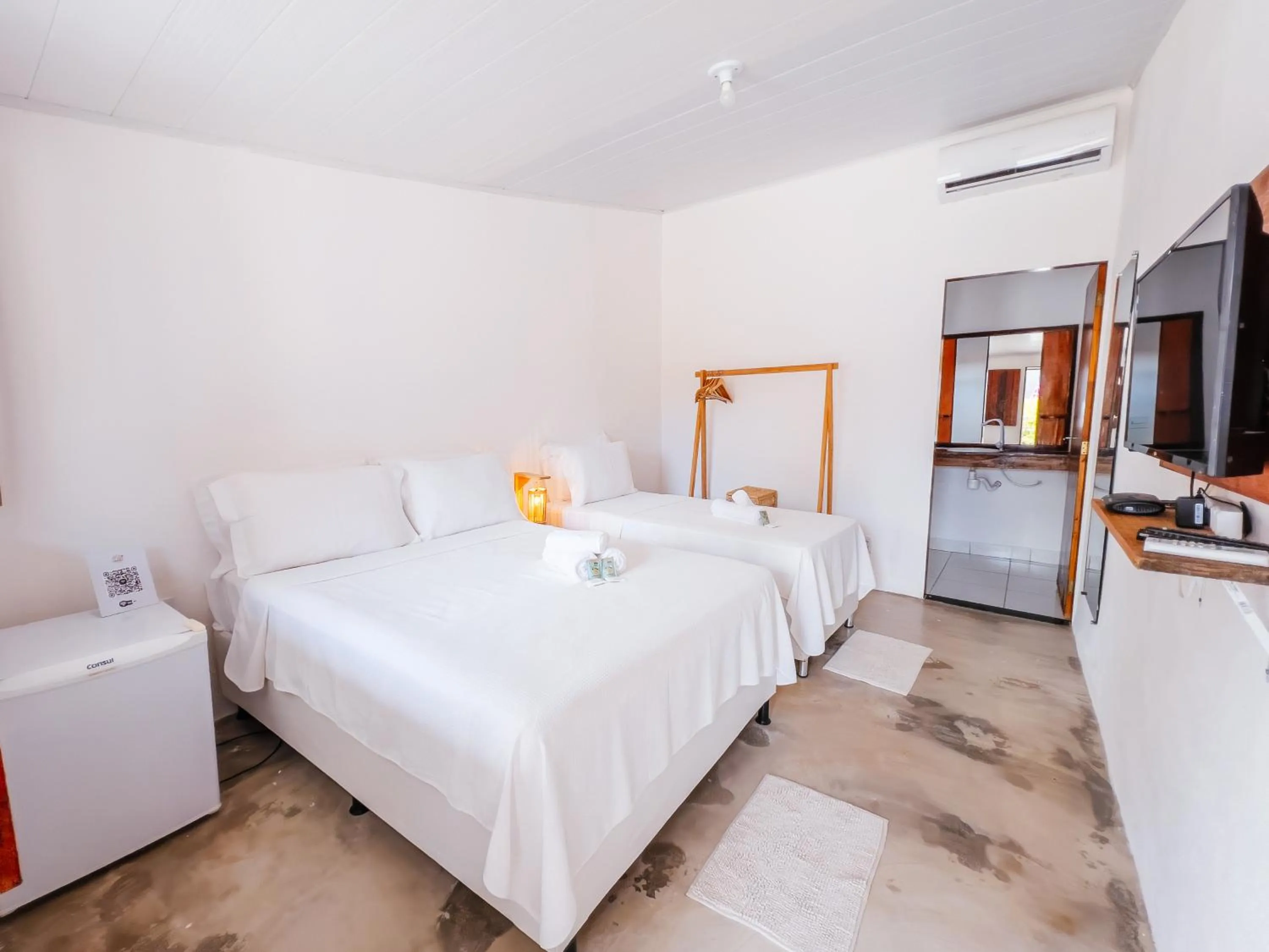 Bed in Pousada do Enildo