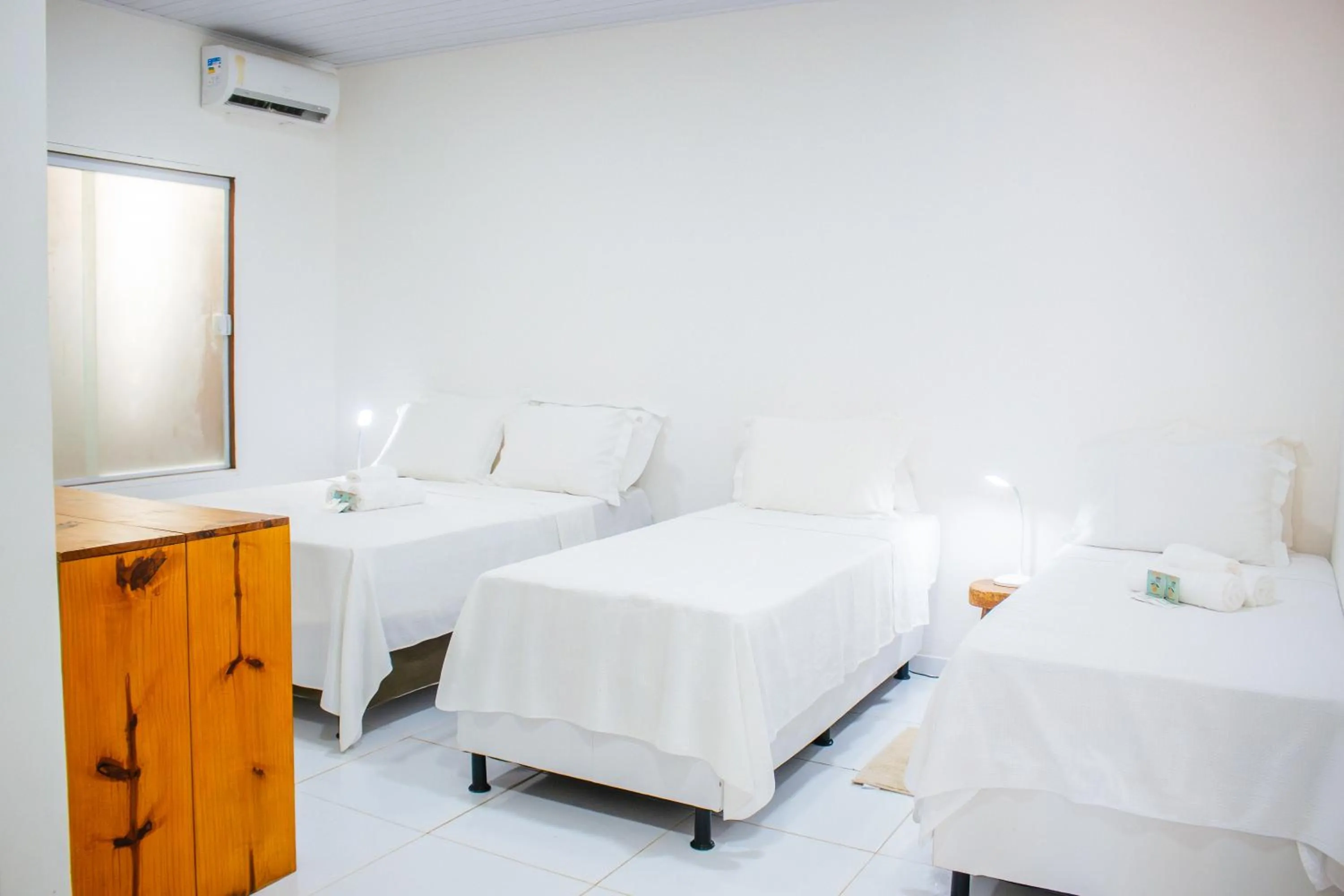 Bed in Pousada do Enildo