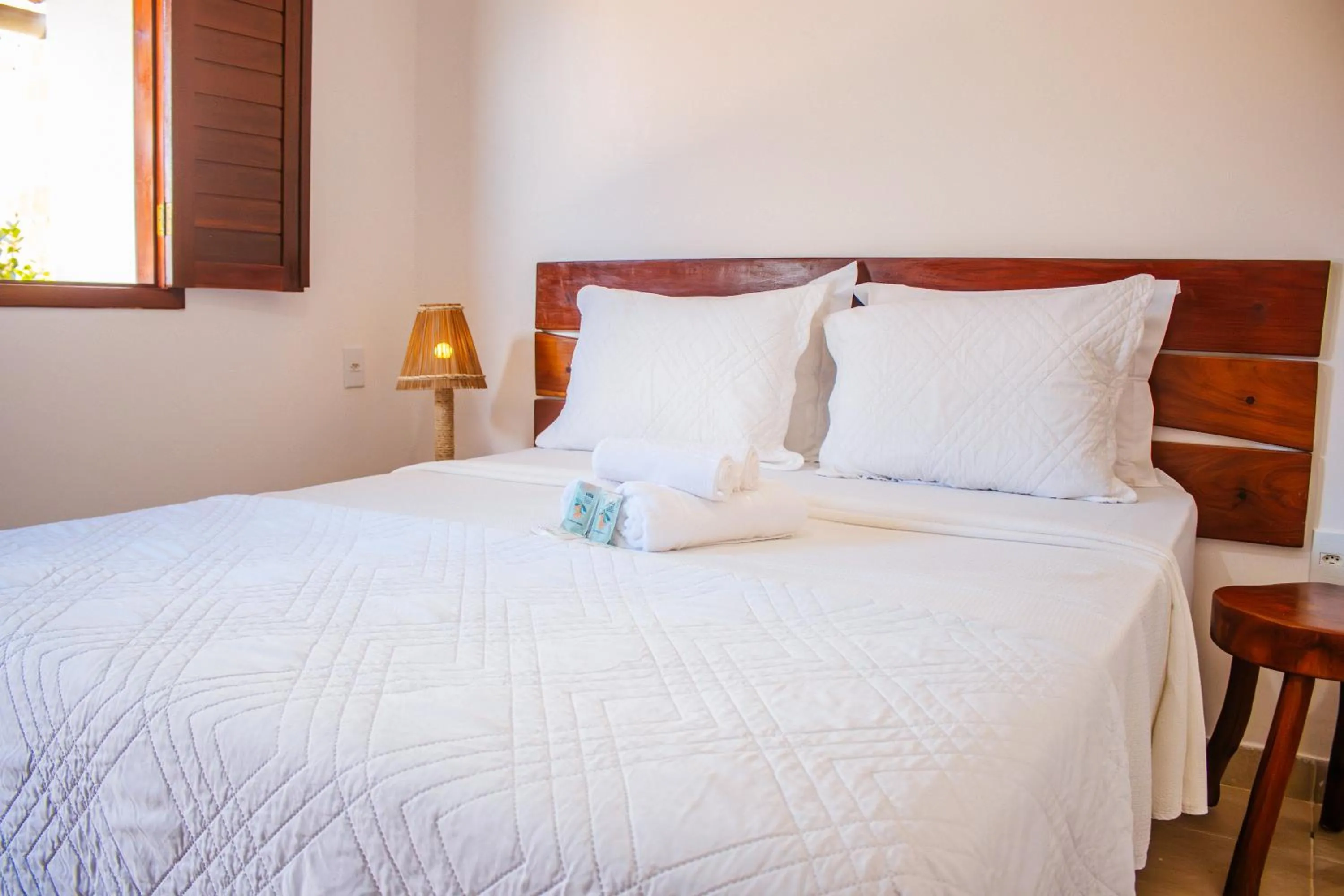 Bed in Pousada do Enildo