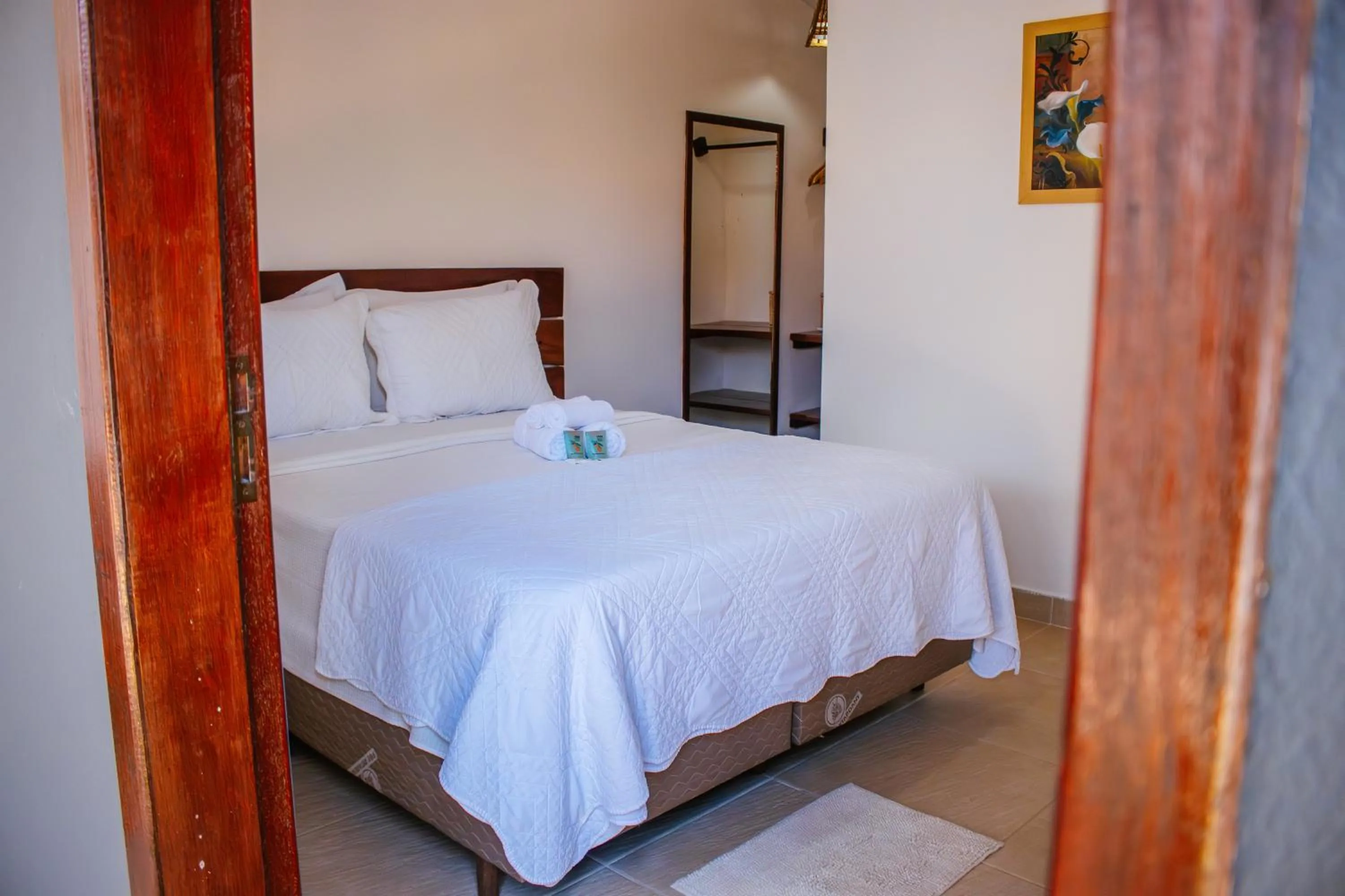 Bed in Pousada do Enildo