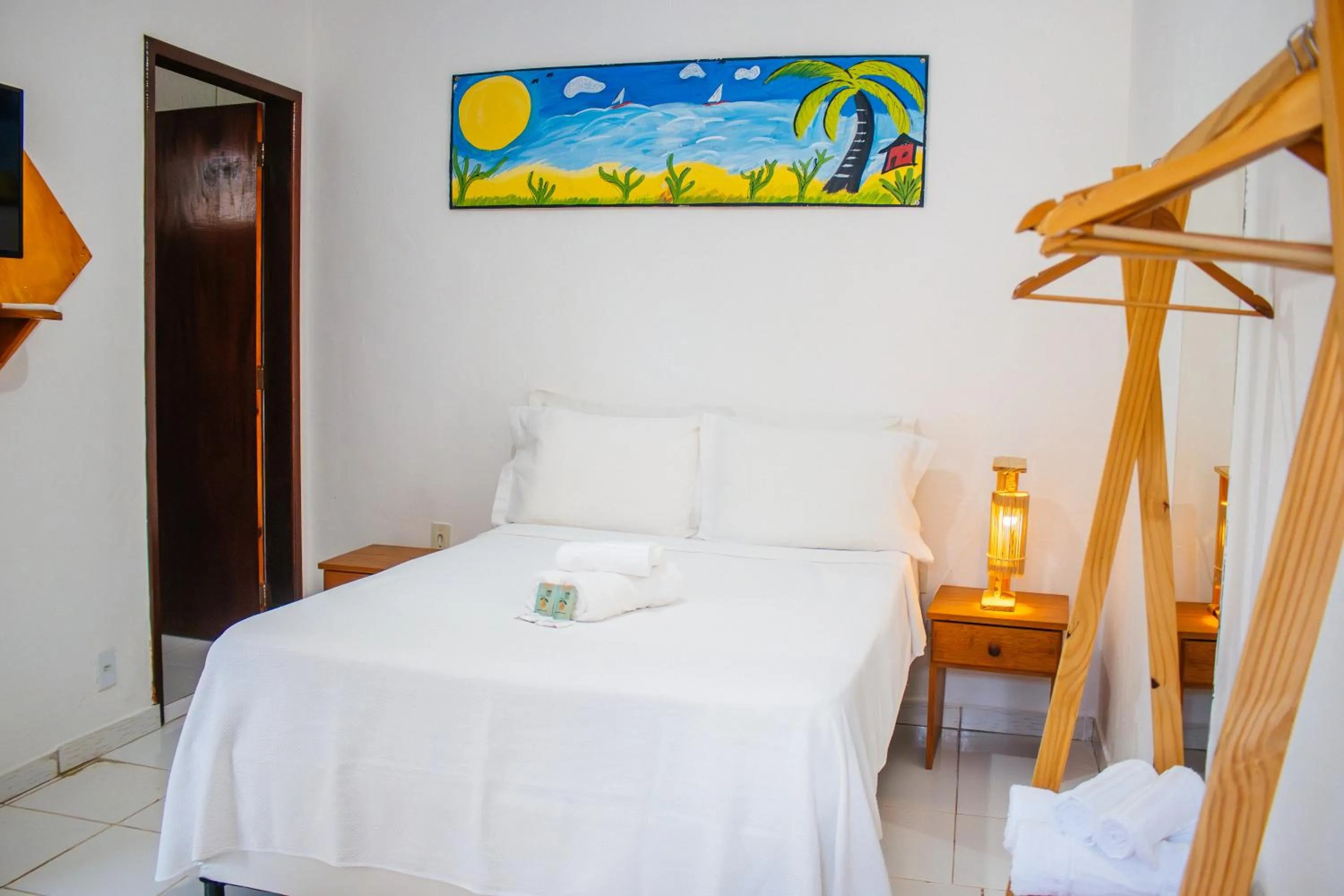 Bed in Pousada do Enildo