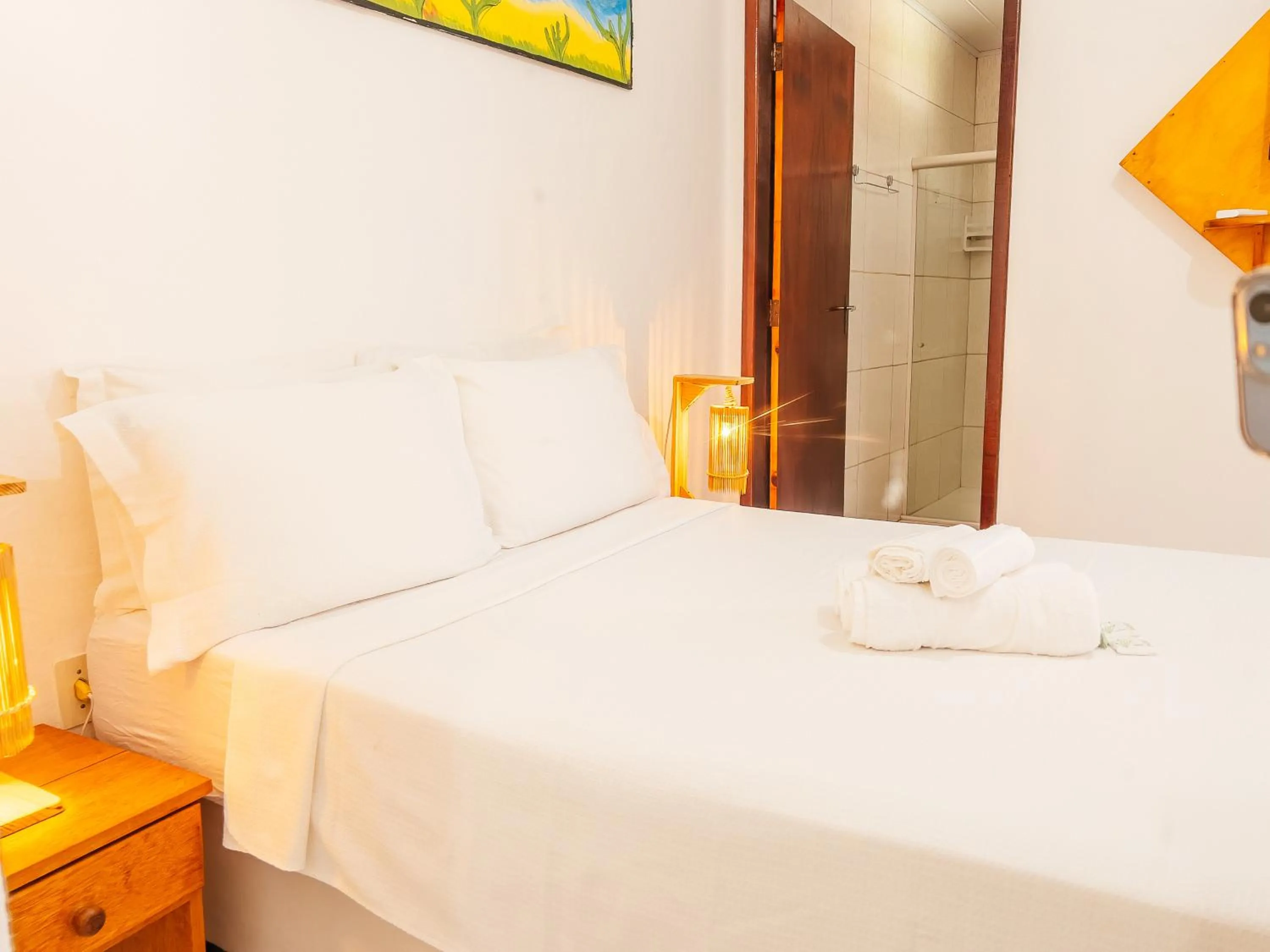 Bed in Pousada do Enildo