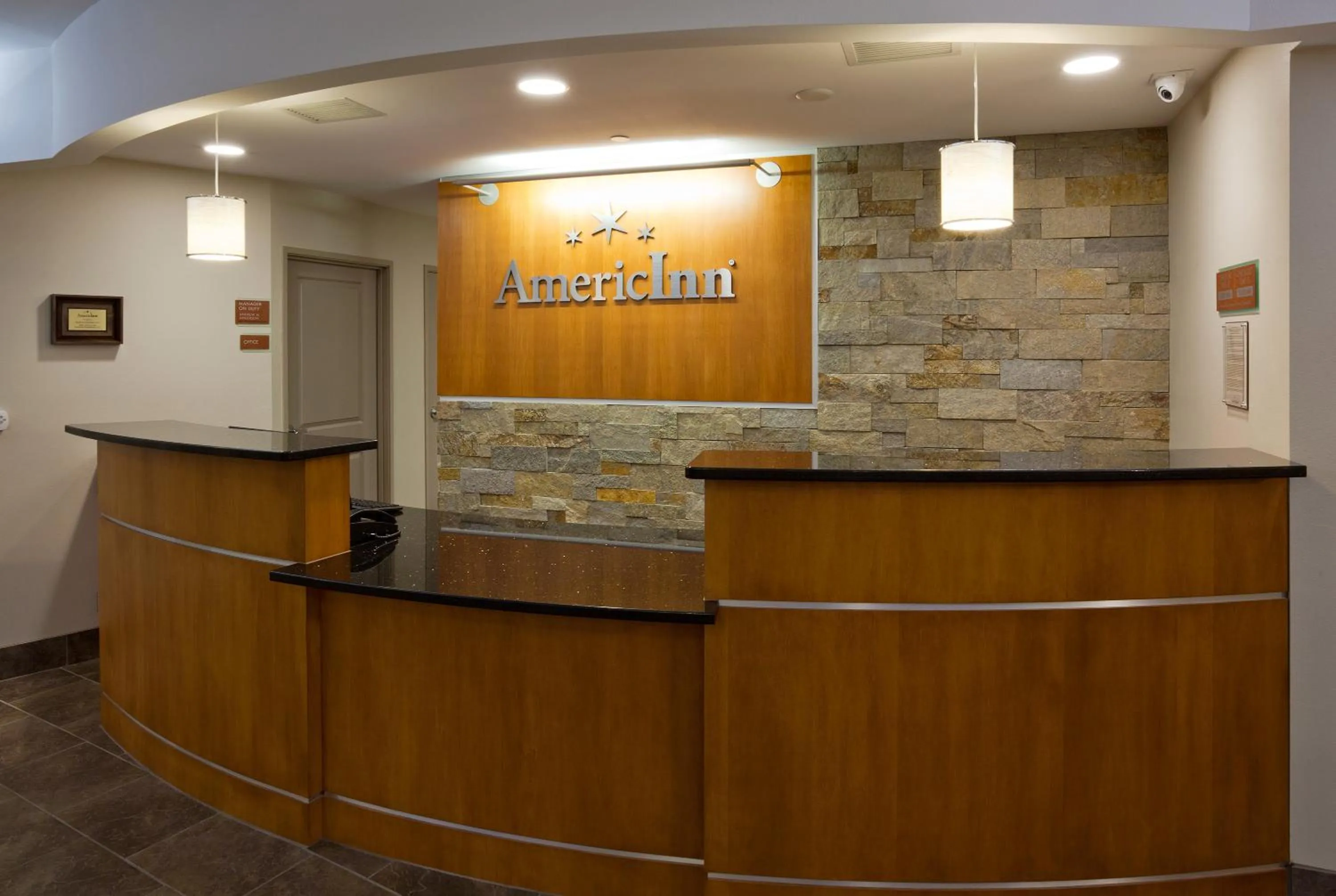 Lobby or reception in AmericInn by Wyndham Waupun